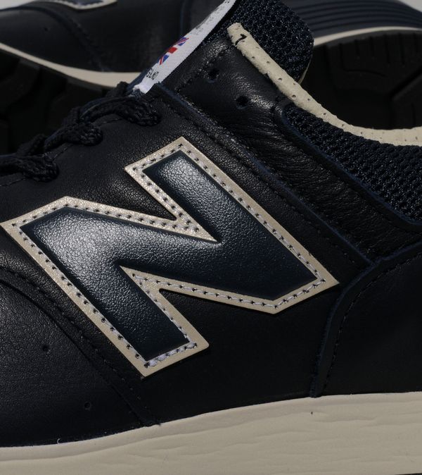 new balance 576 black leather