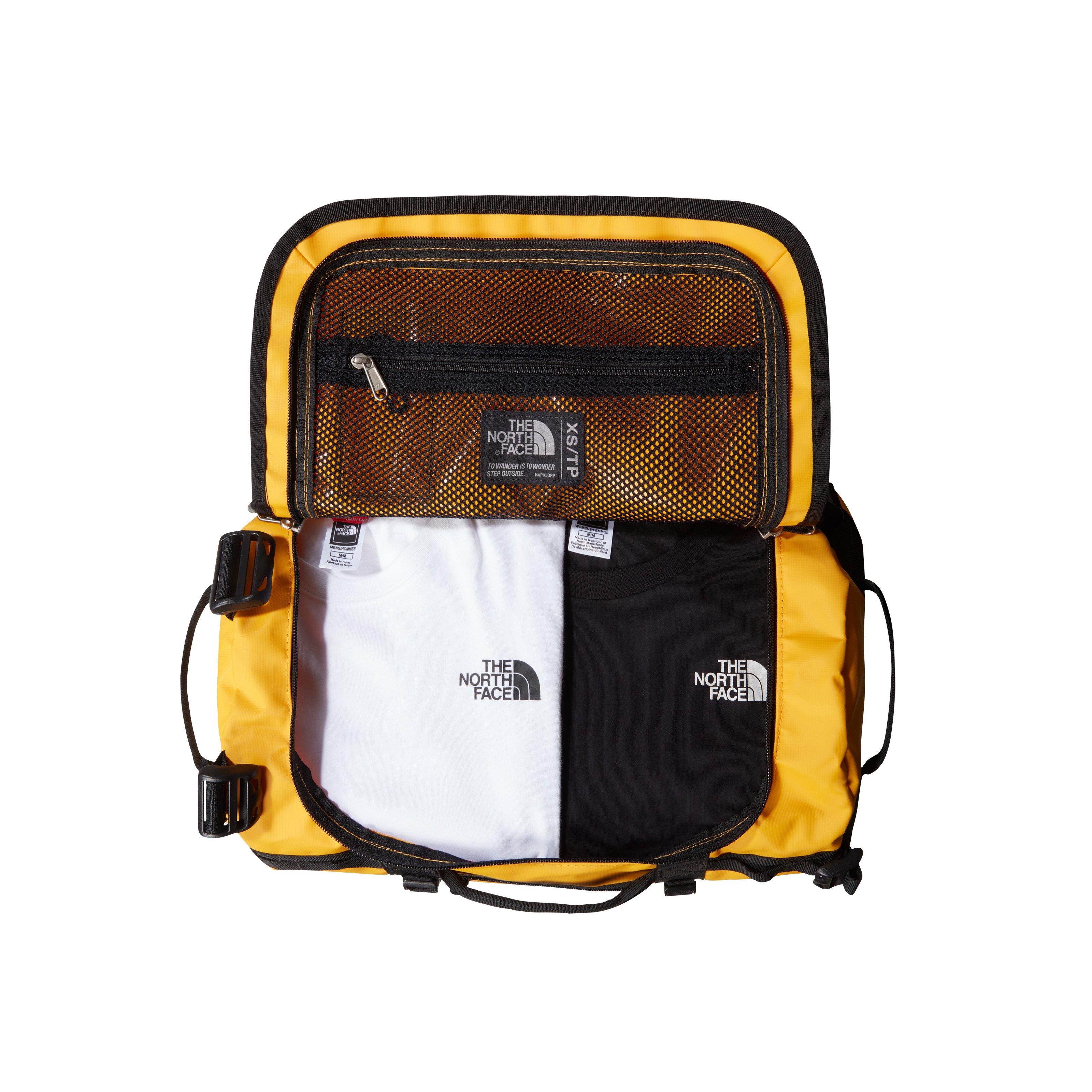 North face duffel hot sale small yellow