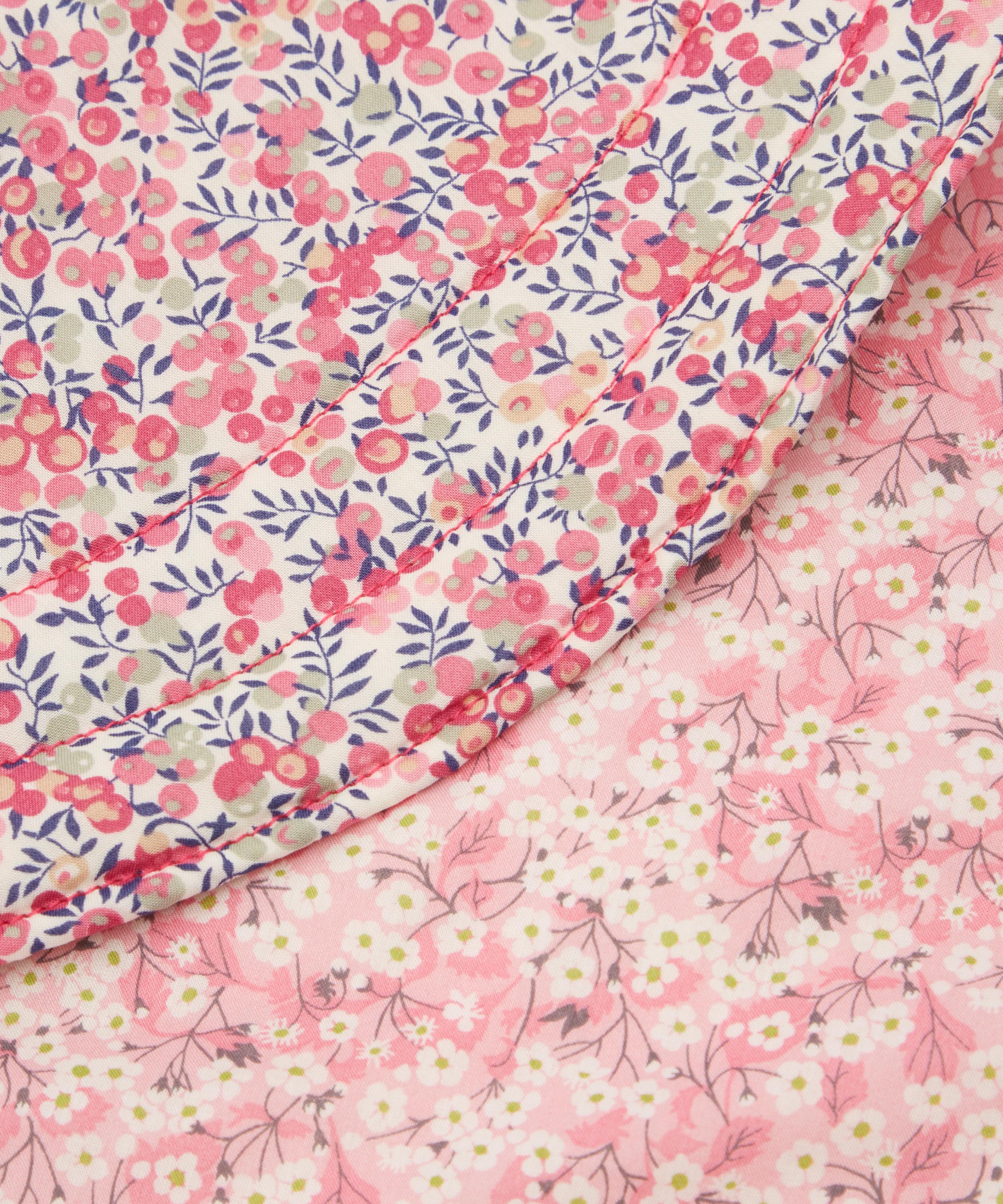 Coco & Wolf Mitsi Valeria And Wiltshire Bud Stitch Edge Circle Placemat In Pink