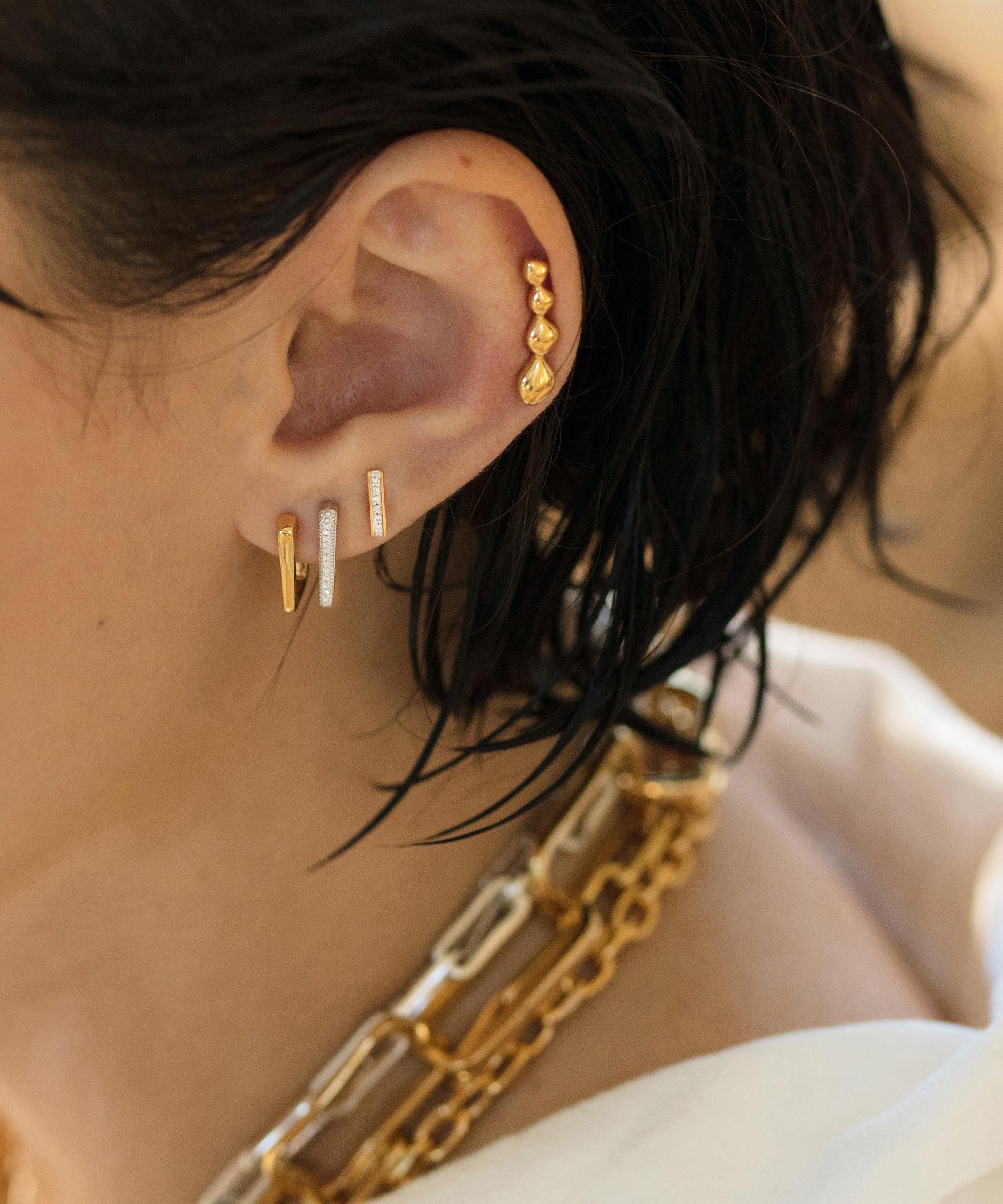 Shop Monica Vinader Gold Plated Vermeil Silver Signature Skinny Diamond Stud Earrings