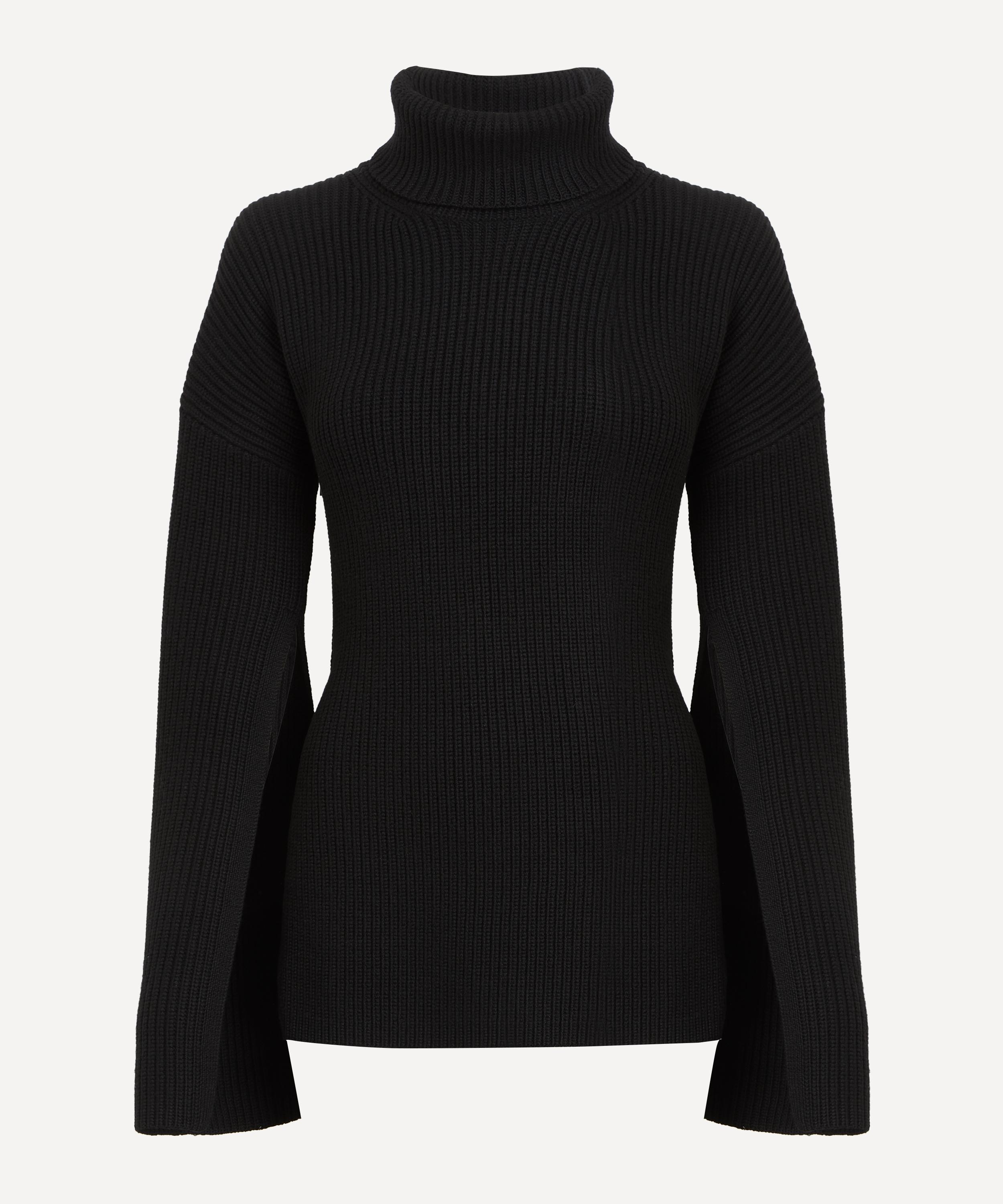 Totême Ribbed-knit Wool Turtleneck Sweater In Black
