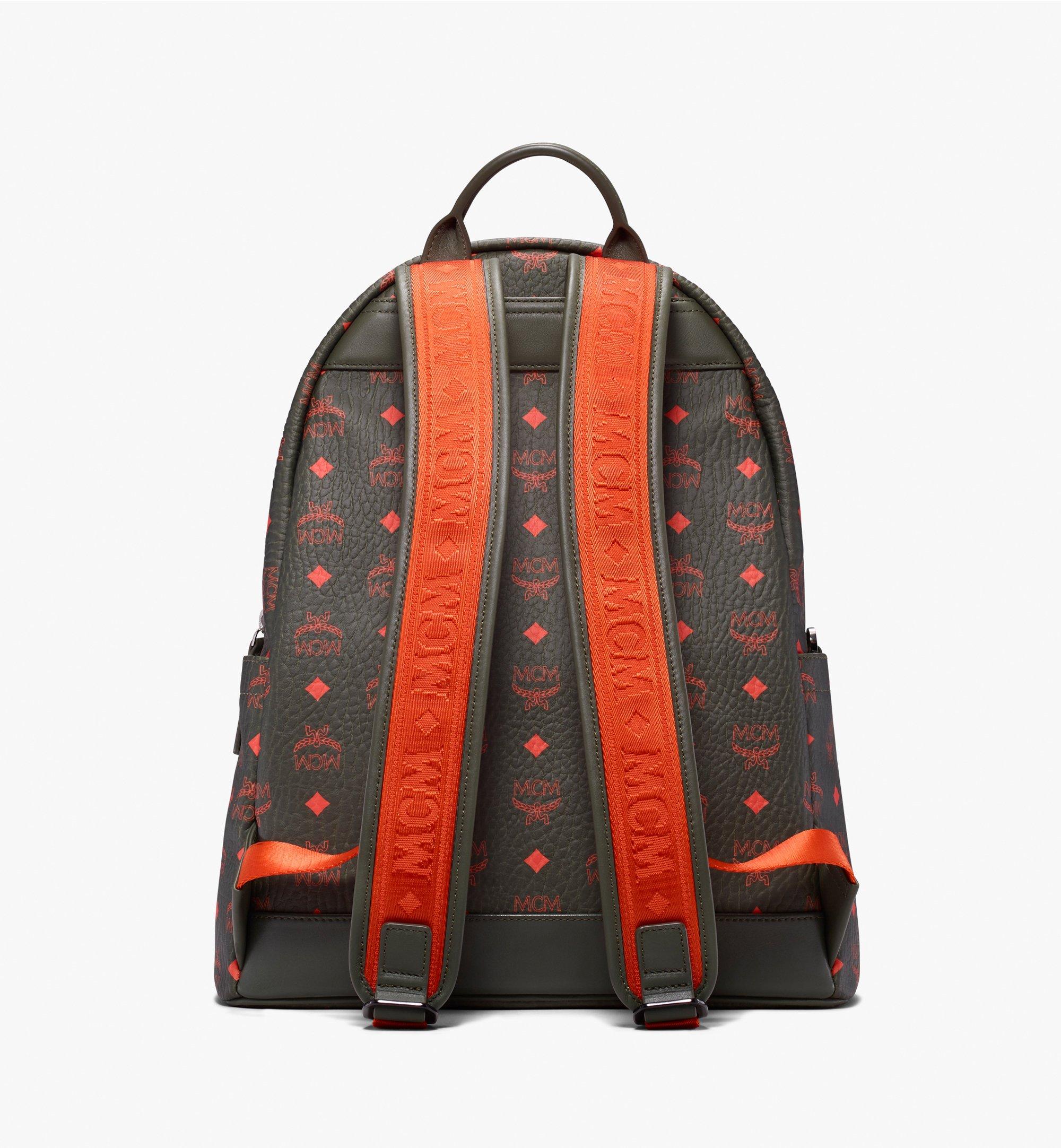 green mcm backpack