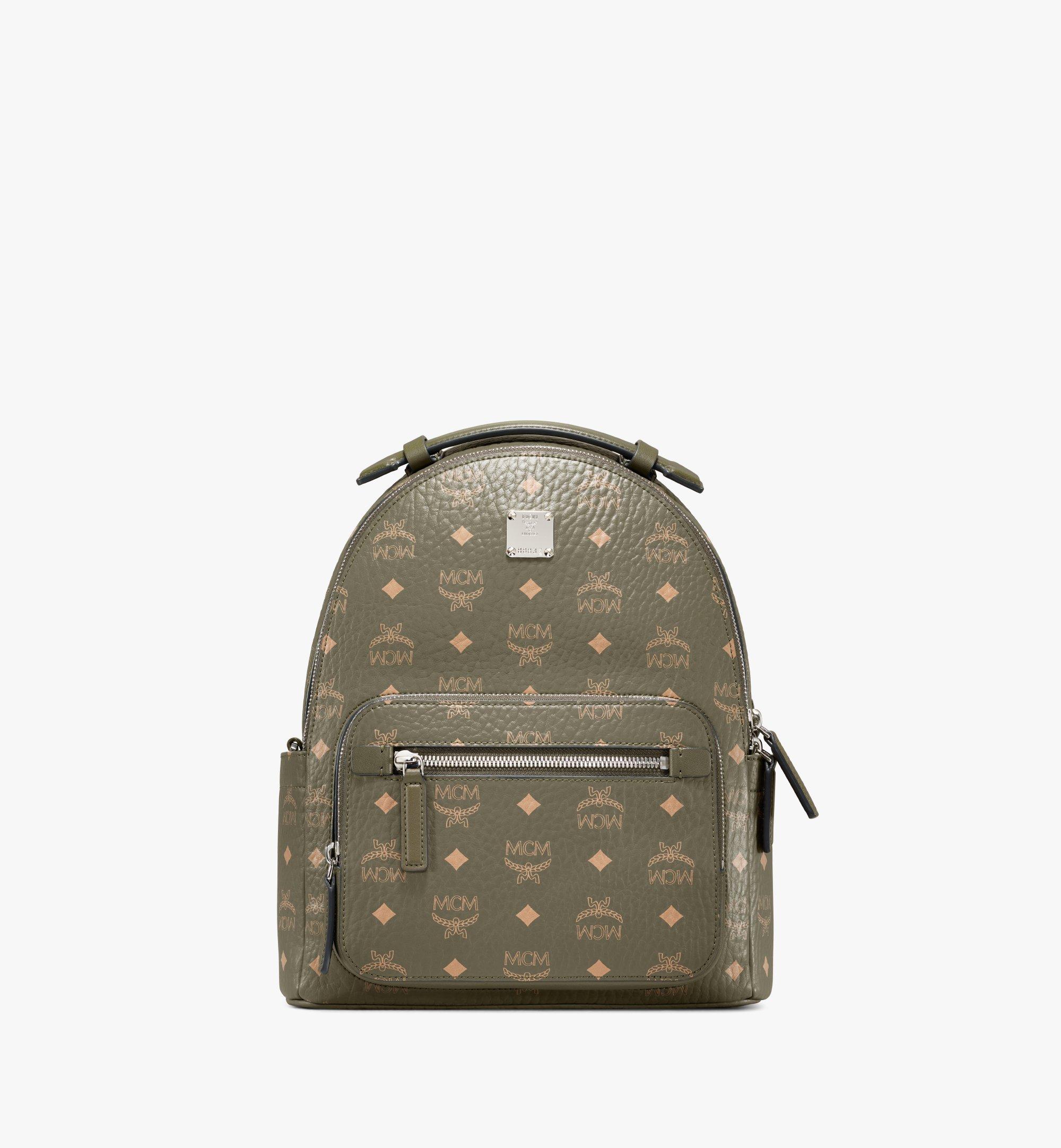 green mcm backpack