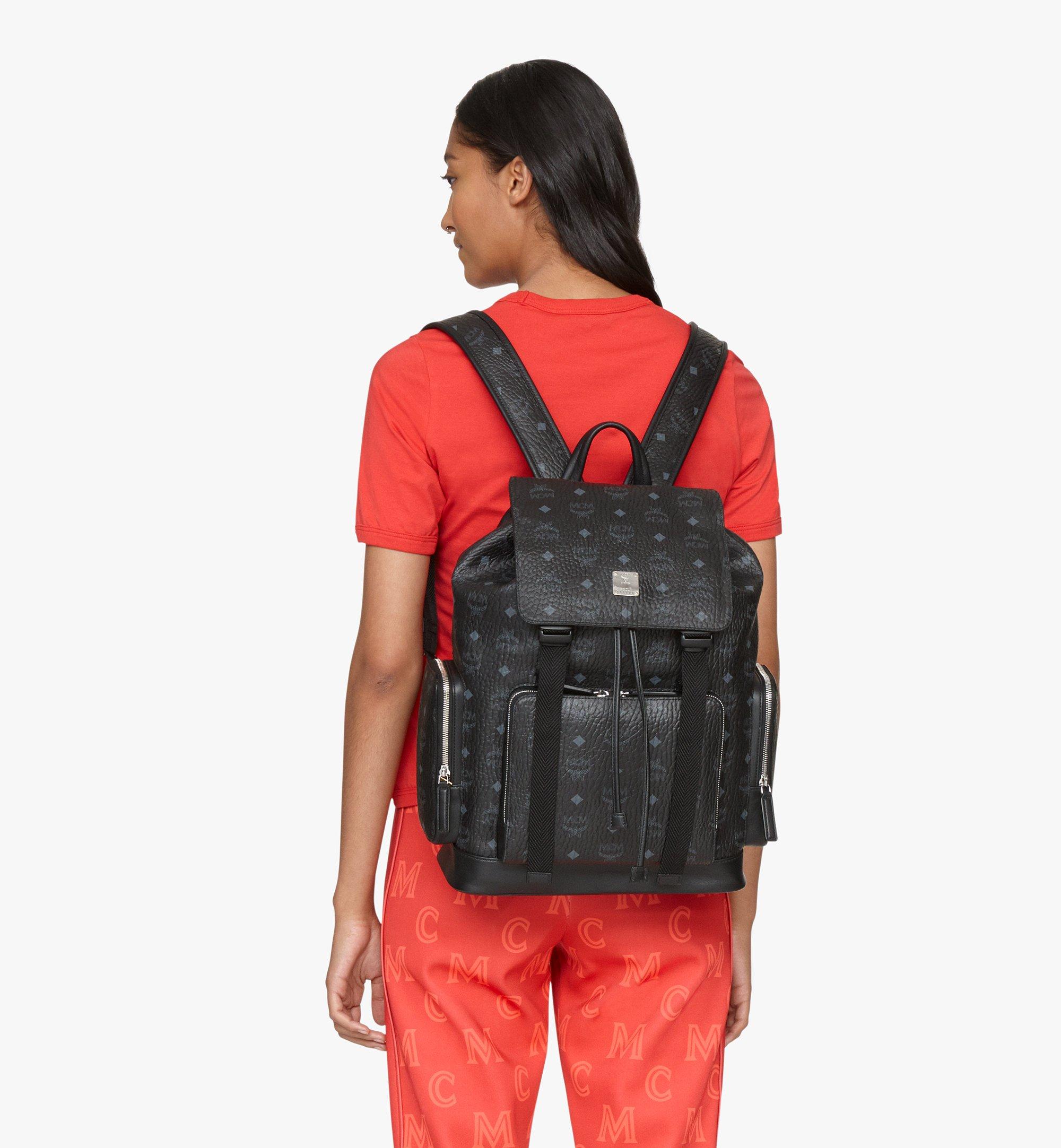 red and black mcm backpack