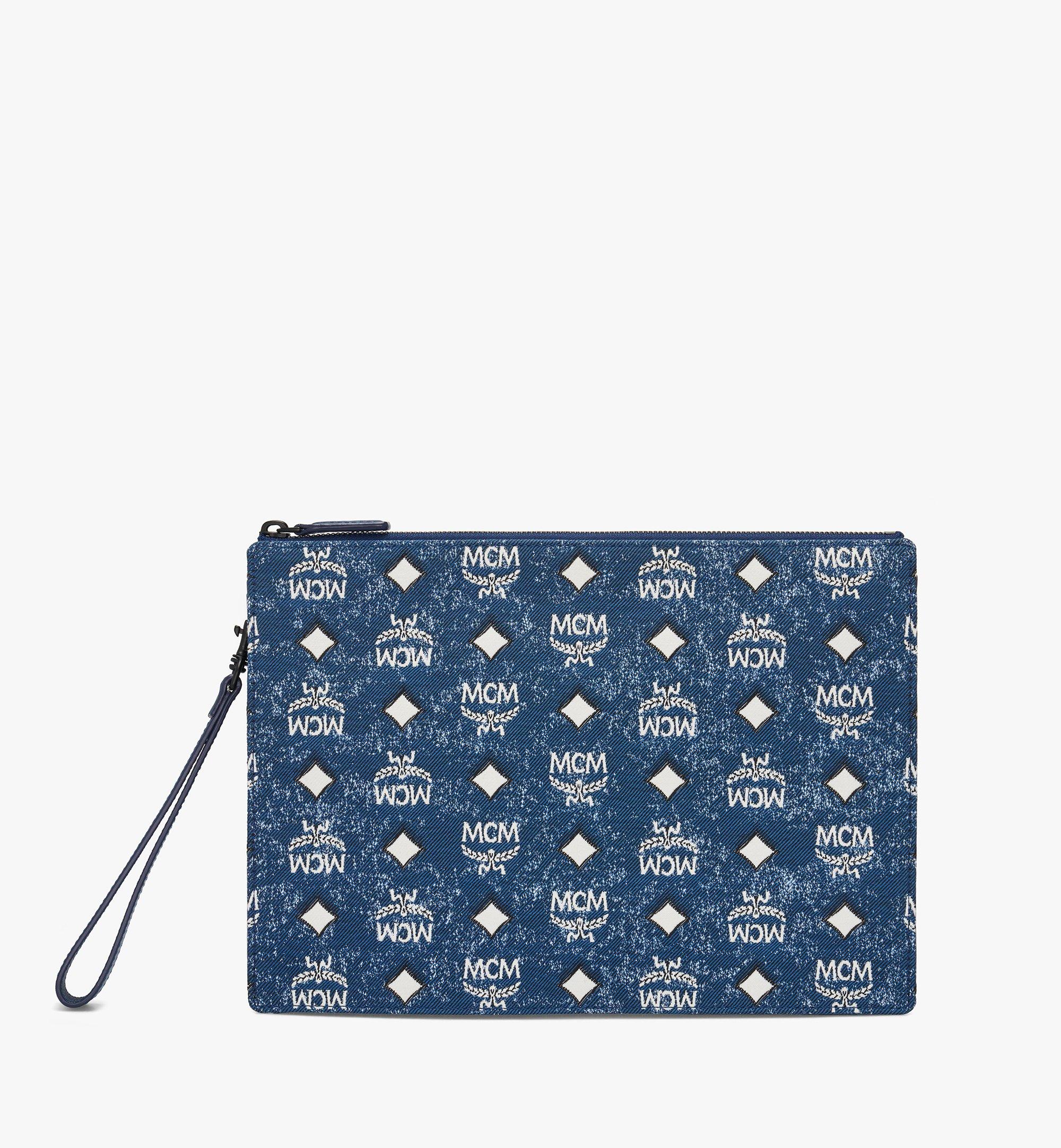 Pochette zippée à dragonne en denim jacquard vintage