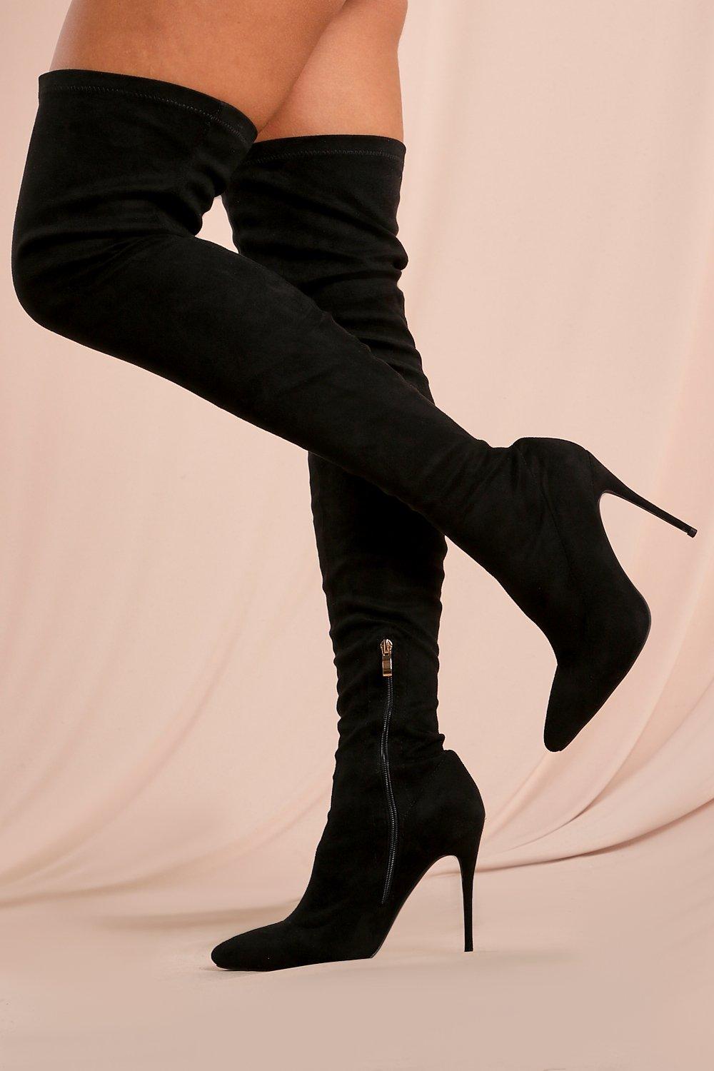 thigh high heeled black boots