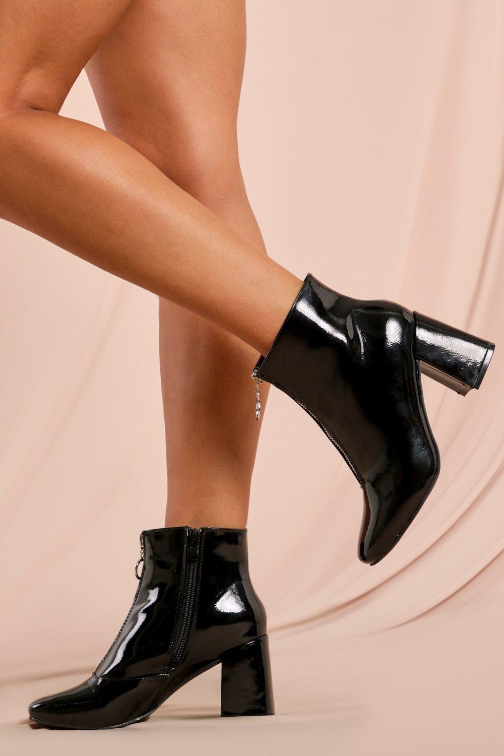 black patent boots with zip up front