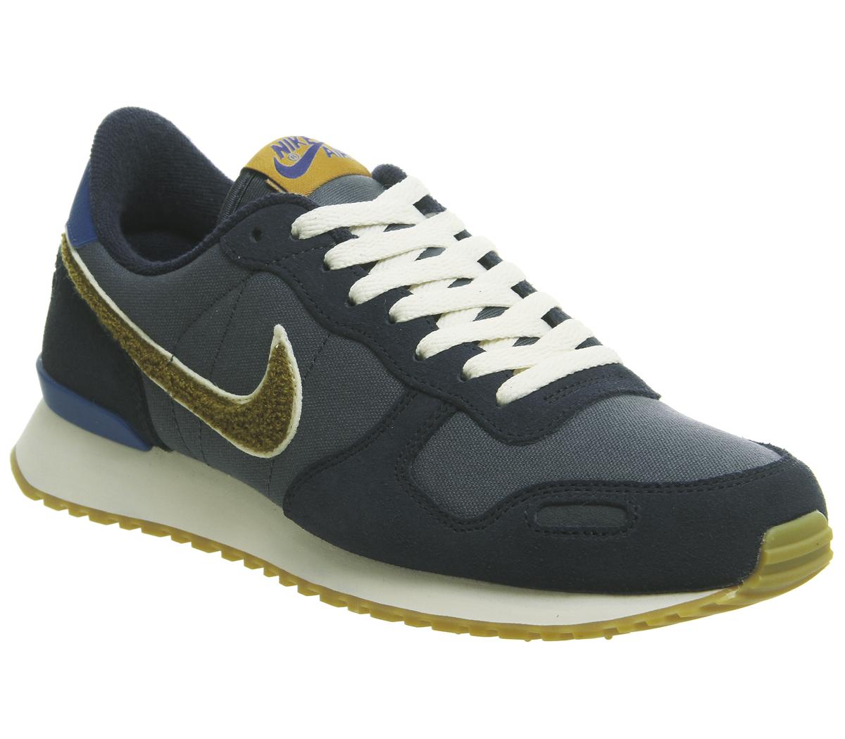 nike yellow air vortex trainers