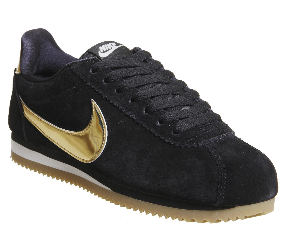 nike gold and black trainers