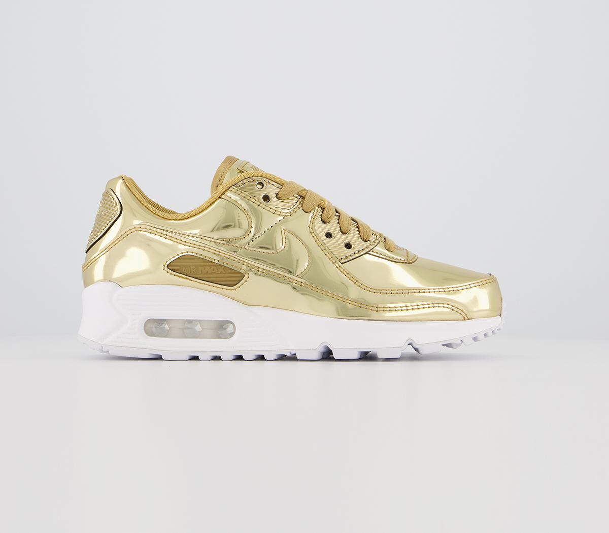 gold trainers nike