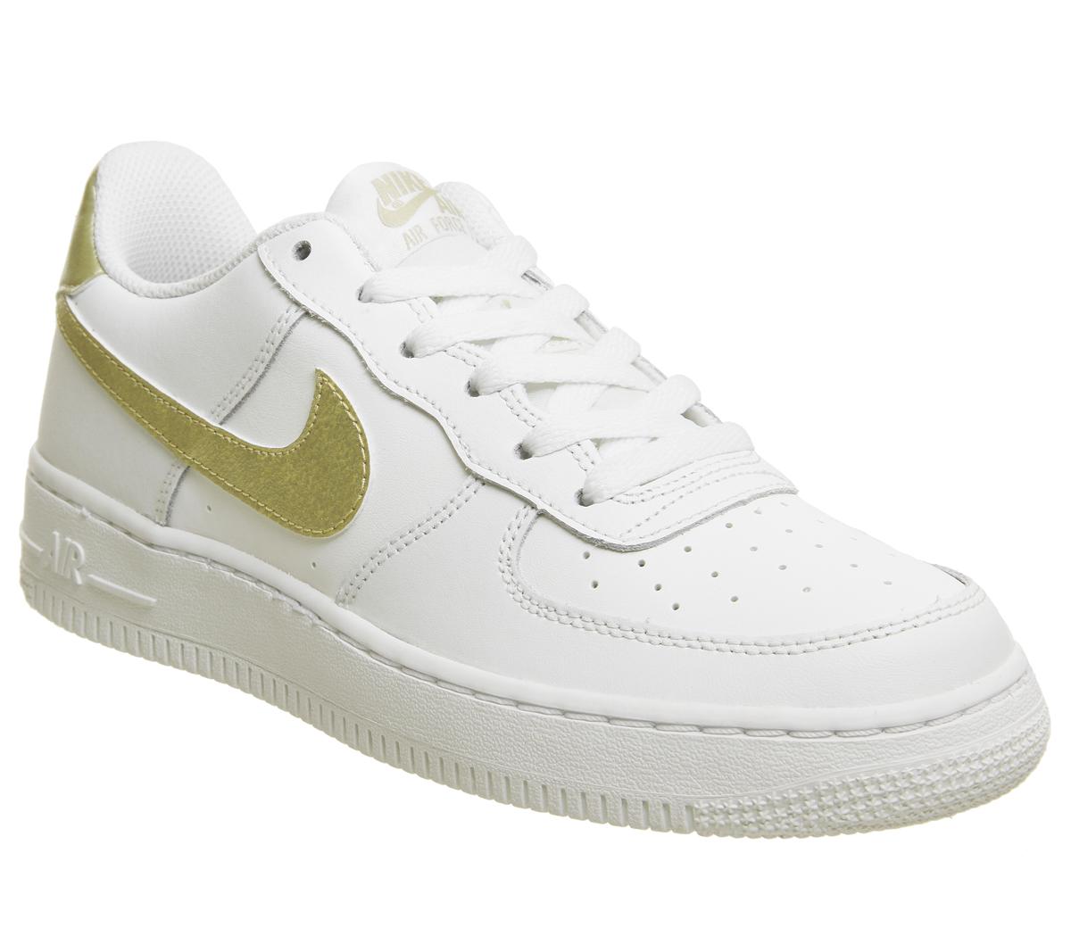 white and gold nike trainers