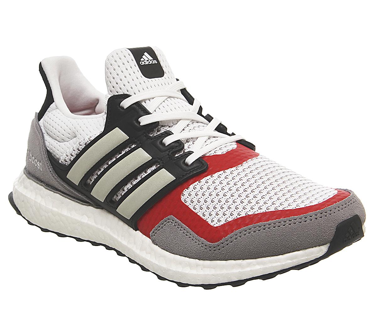 grey and red adidas trainers