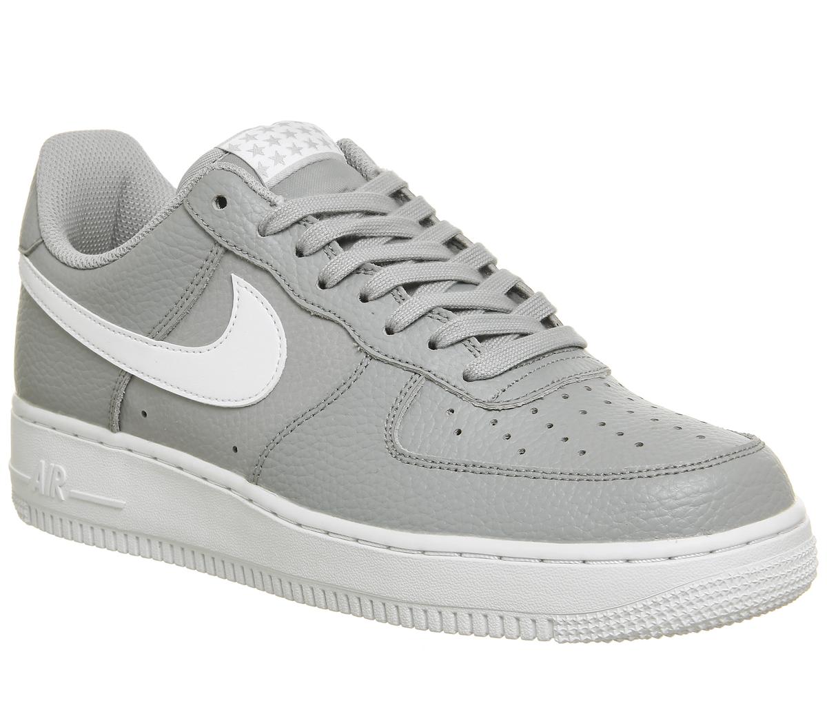 gray and white nike air