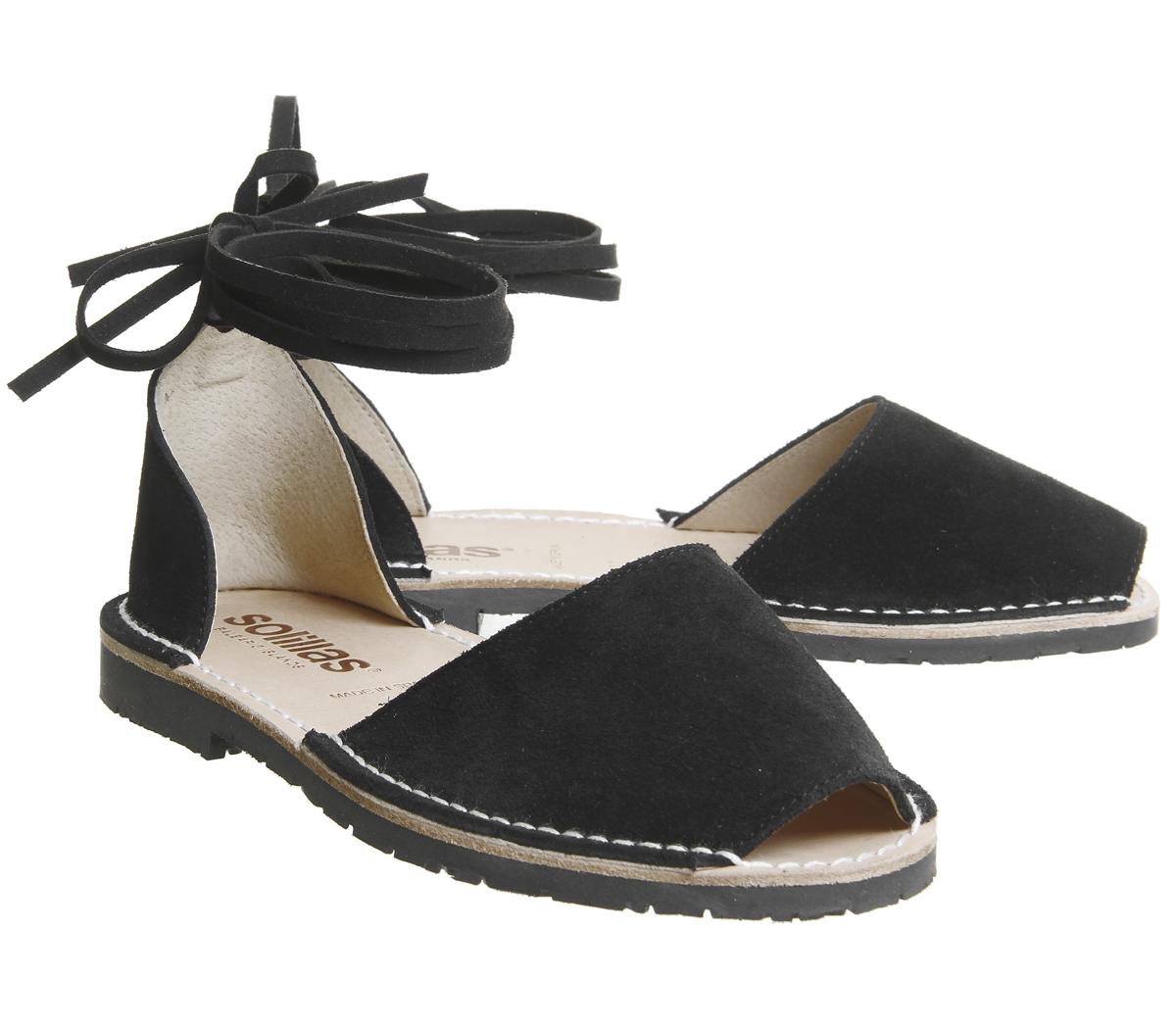 flat black sandals with ankle ties