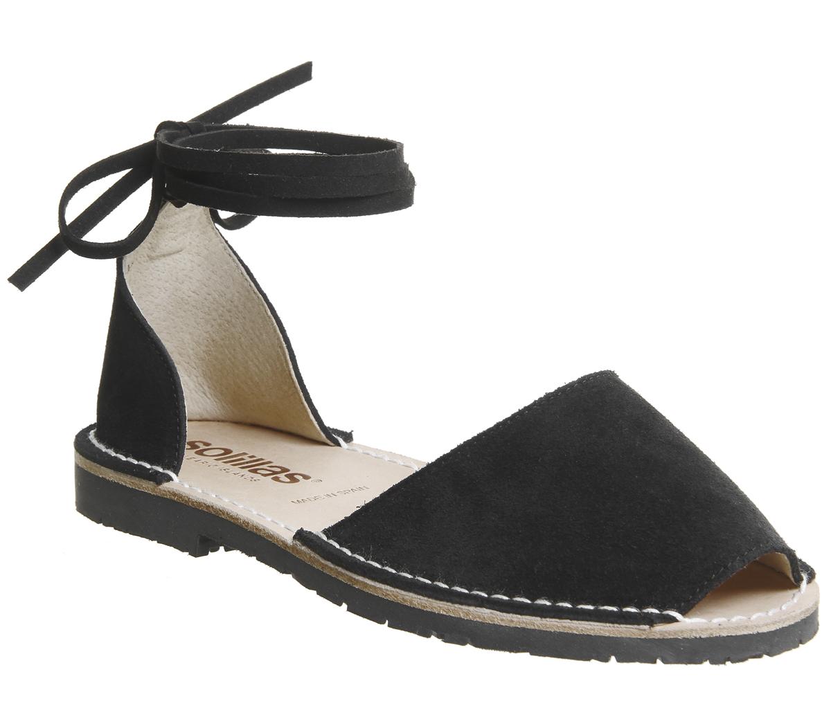 flat black sandals with ankle ties