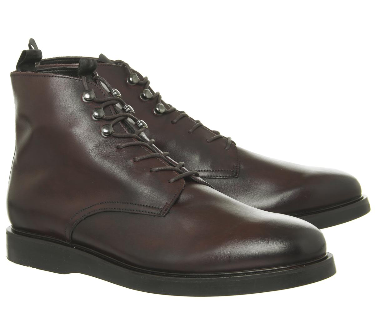h by hudson battle lace up boots in black leather