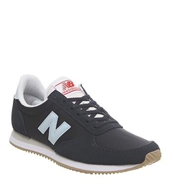 new balance 373 black and gold