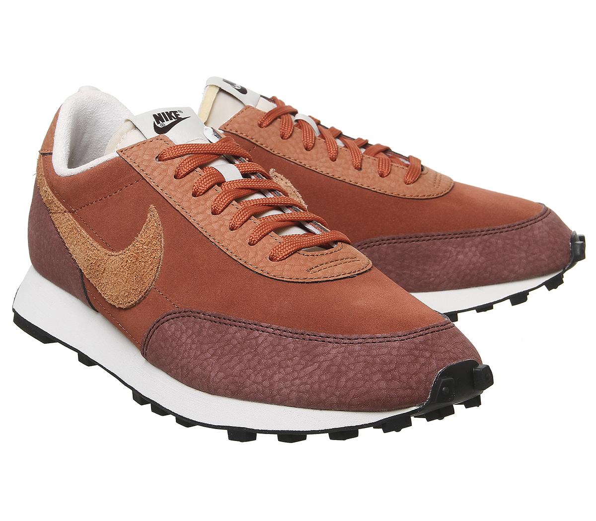 nike daybreak trainers in off white and orange rust