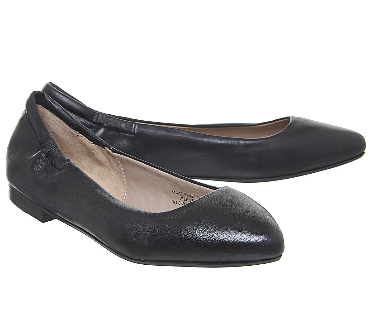 black pointed ballerinas