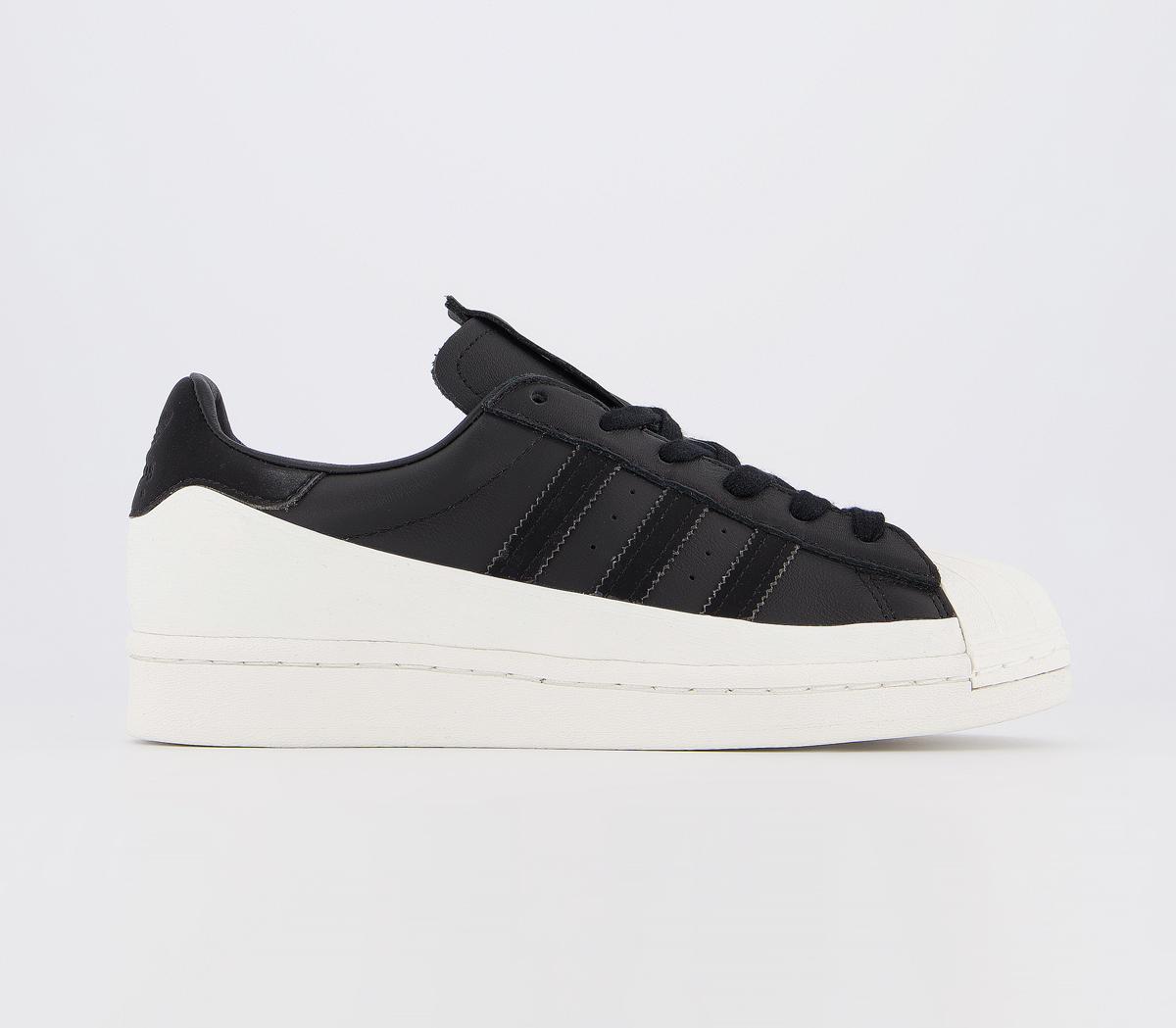 black and white adidas superstar trainers