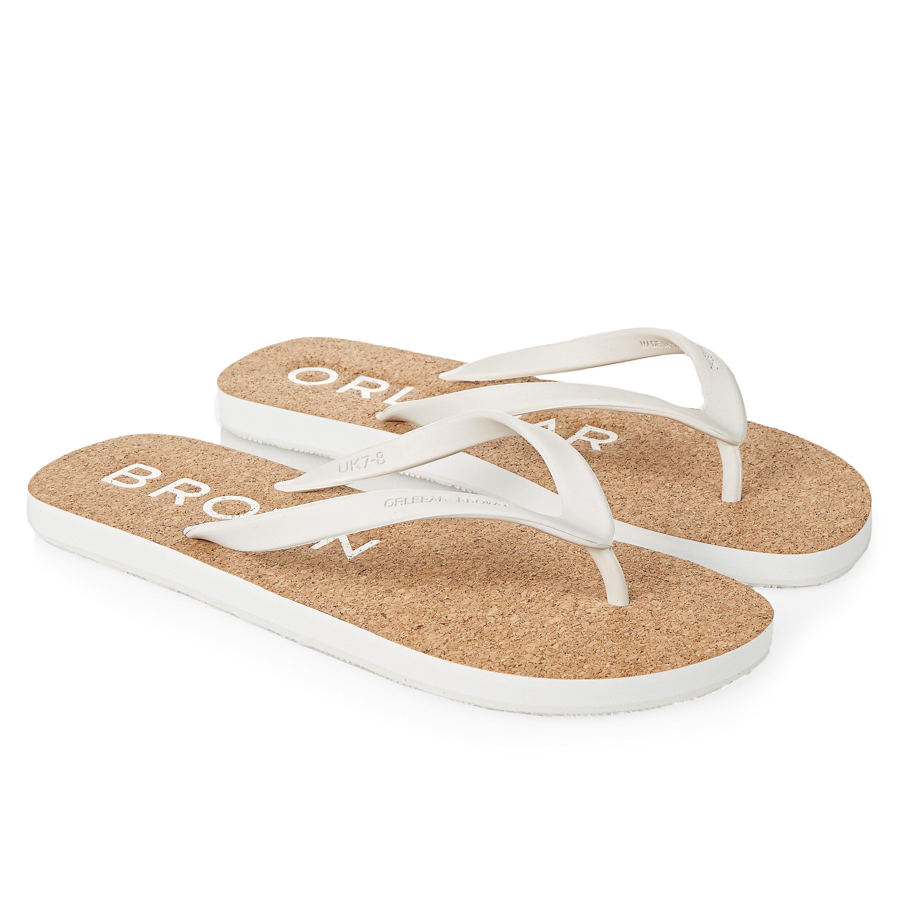 brown and white flip flops