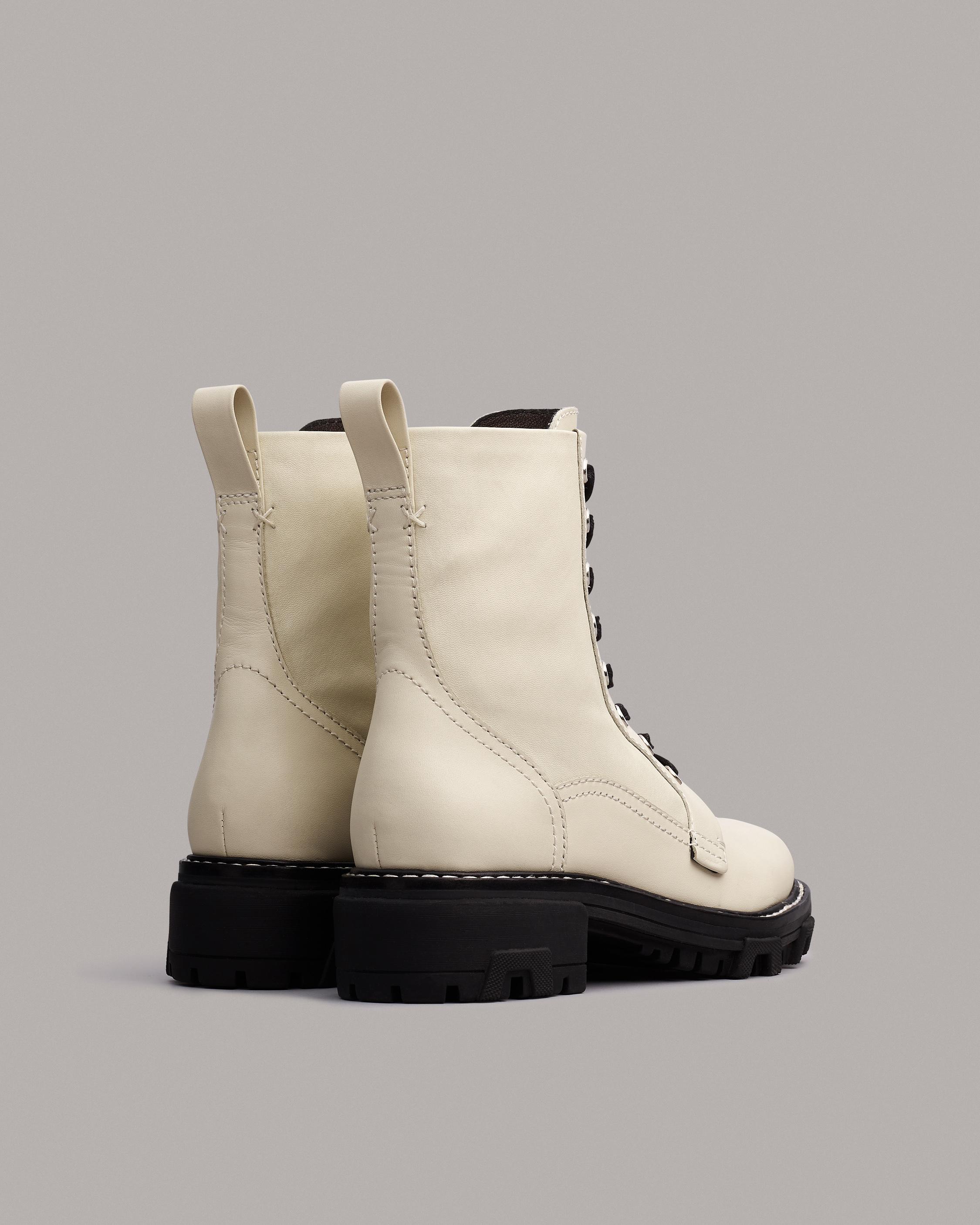 shiloh logo stretch knit and leather sock boot