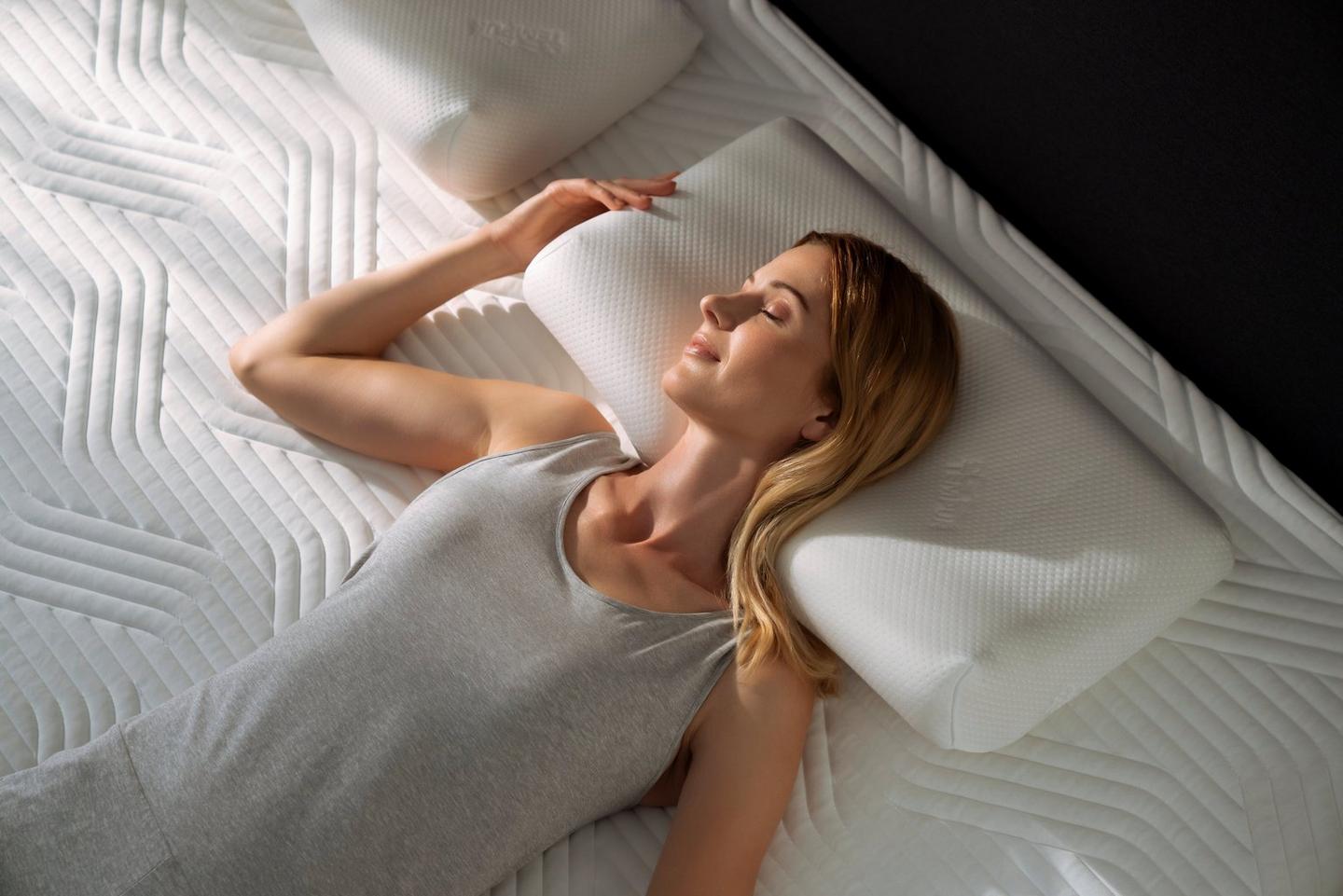 Almohada arqueada para brazo, Ergonómica