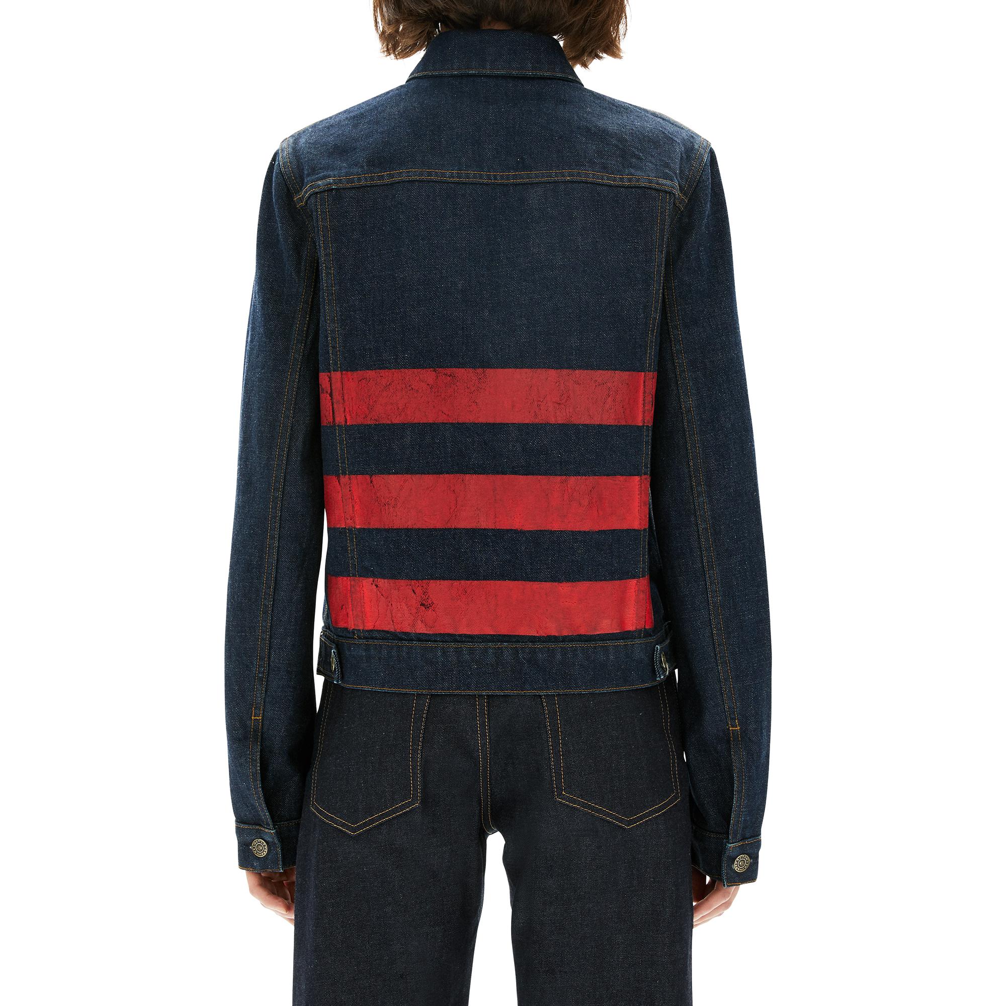 jeans with three red stripes on back pocket