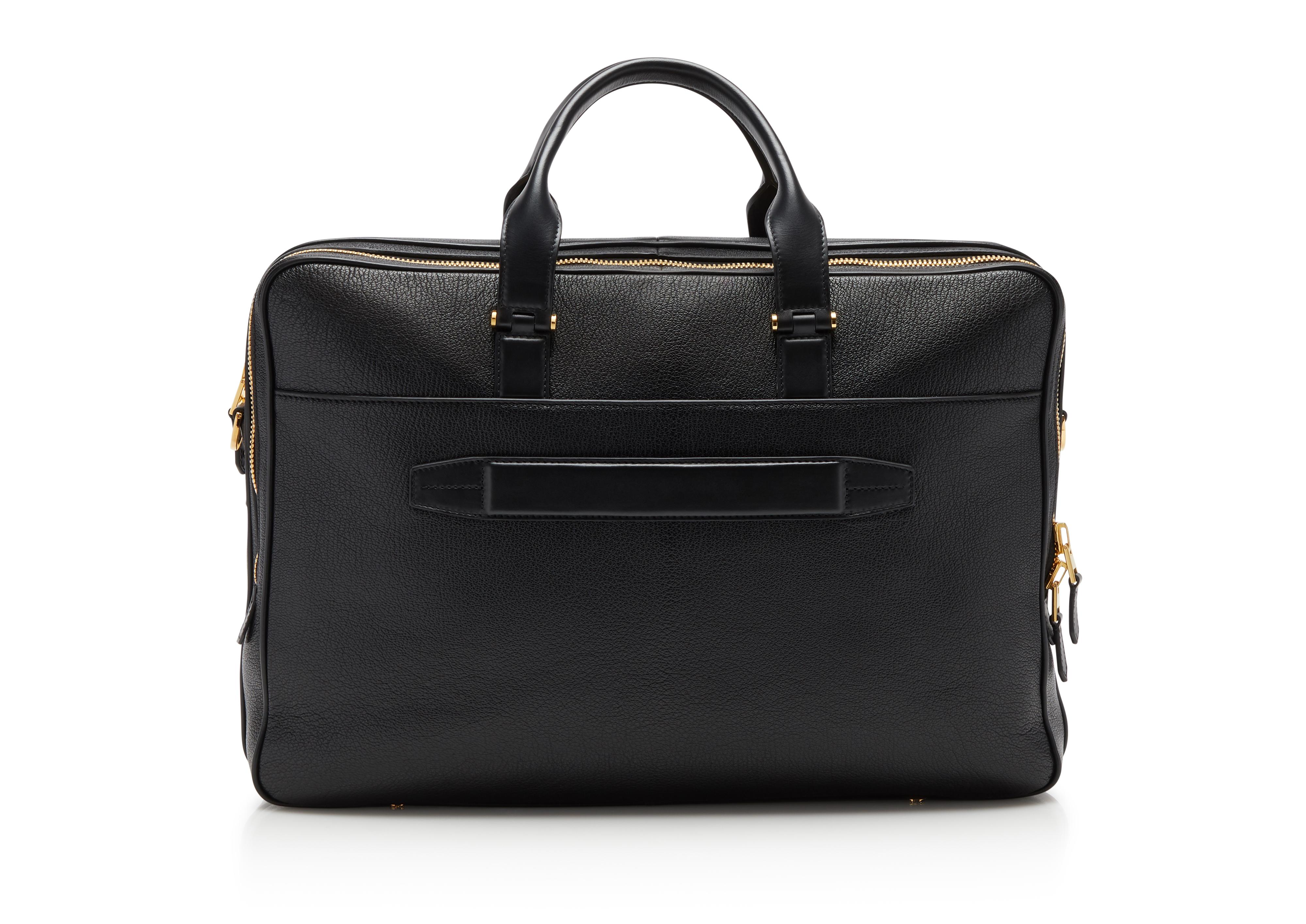 Briefcase with shoulder outlet strap