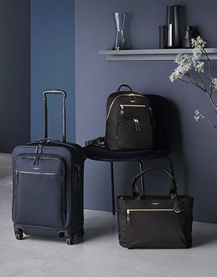 tumi leather carry on luggage