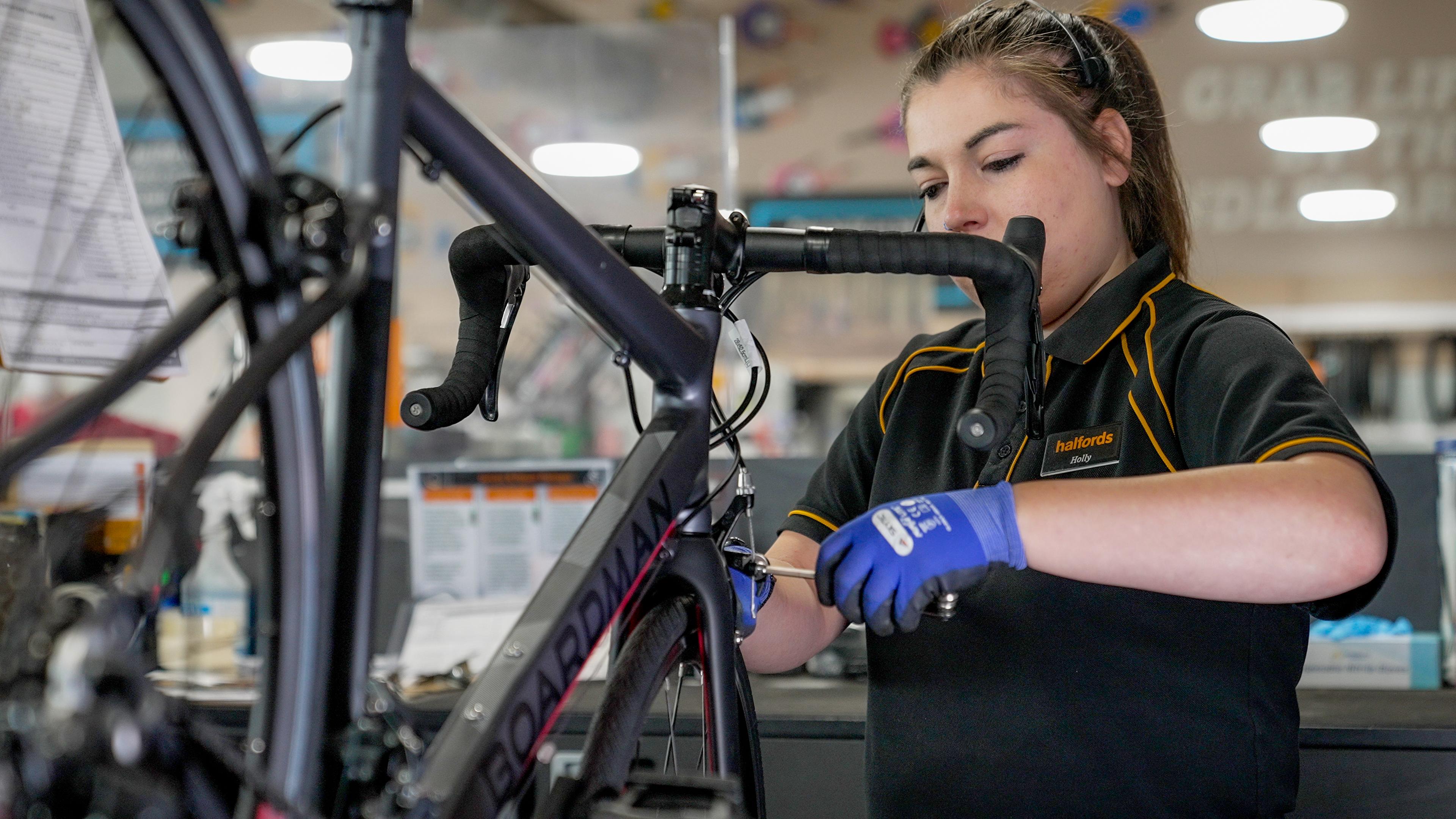 halfords bike servicing costs