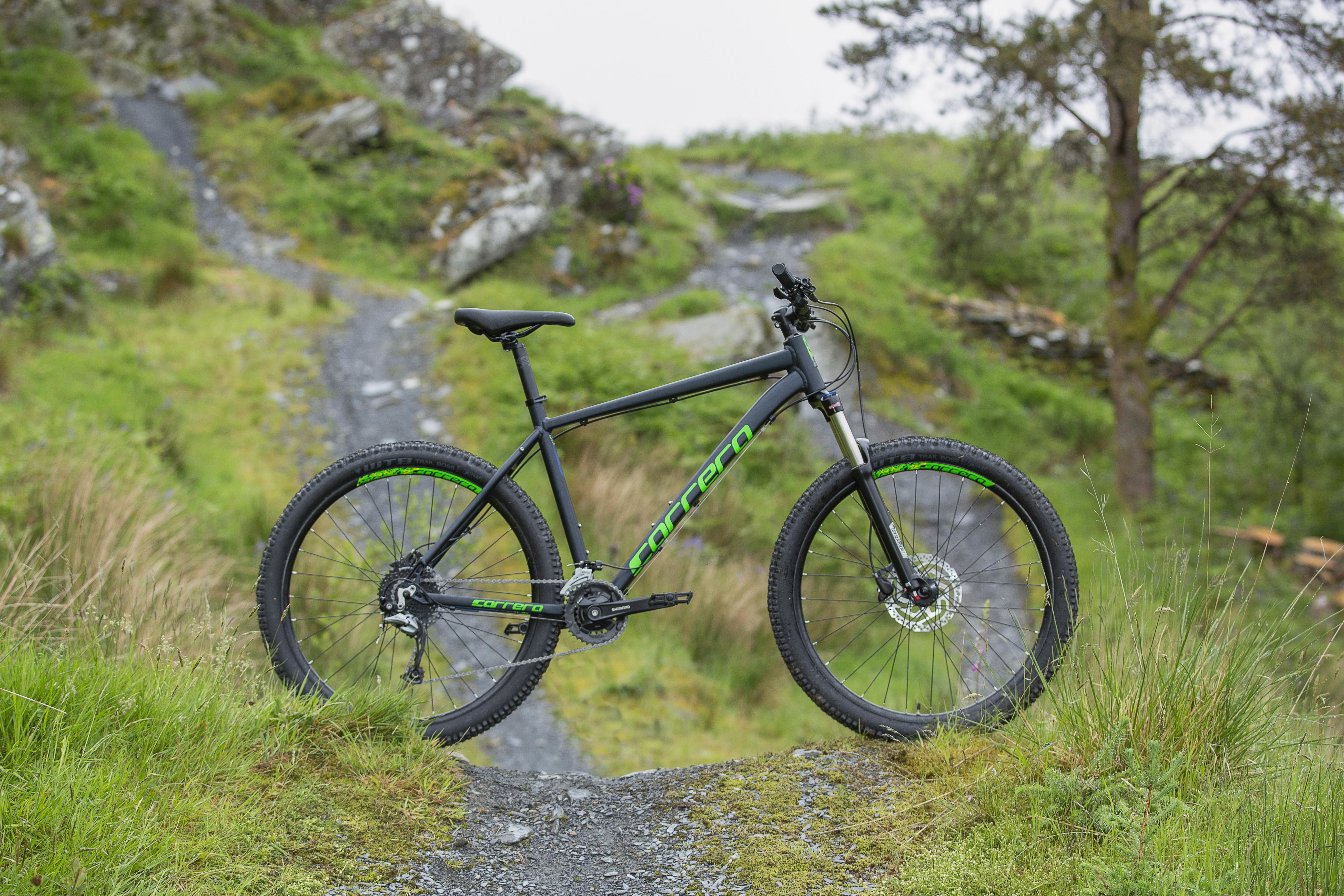 how to raise the handlebars on a carrera bike