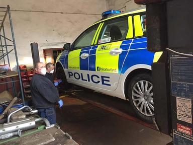 Police car back on the road with a new tyre