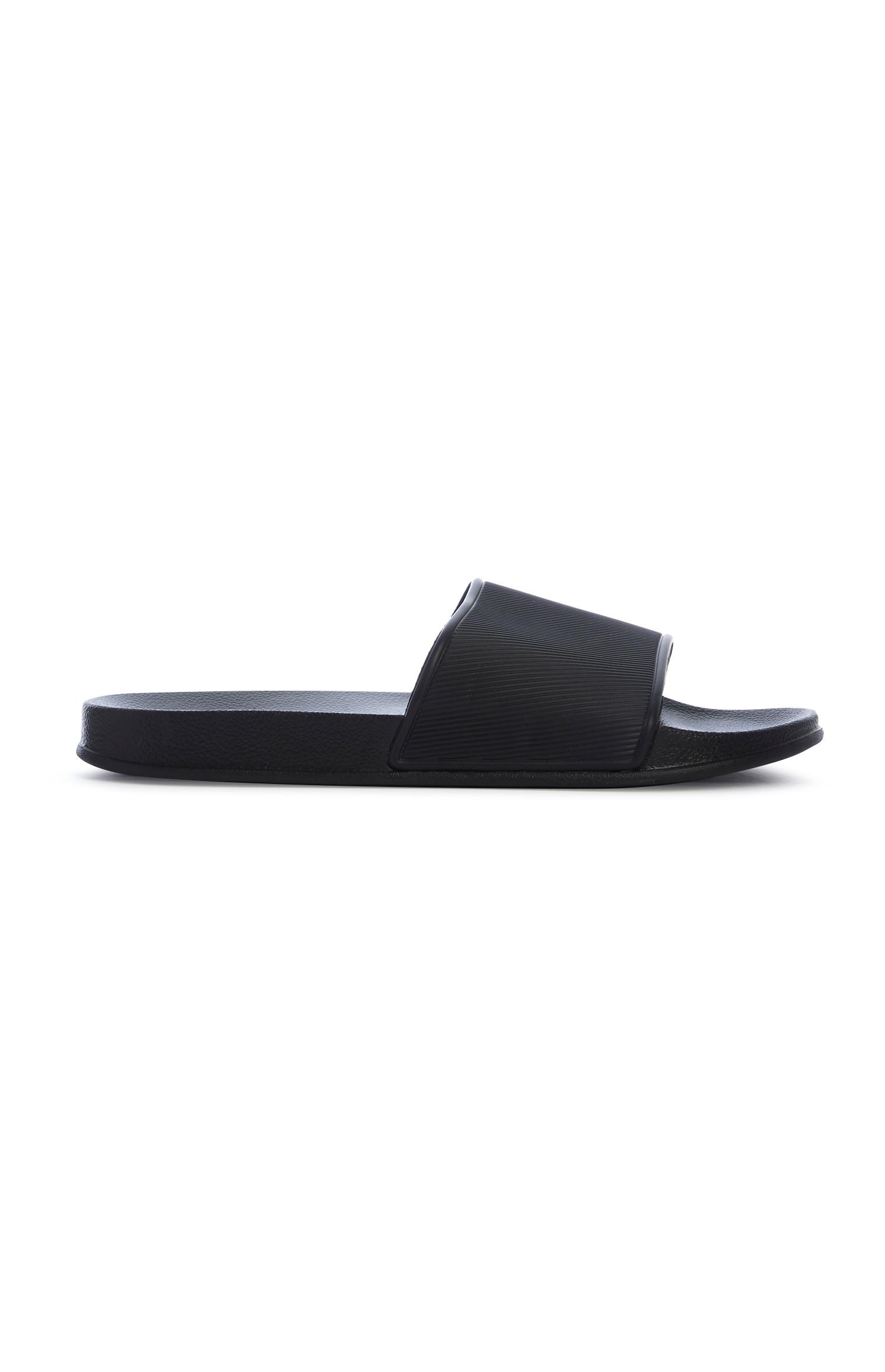 Schwarze Badesandalen