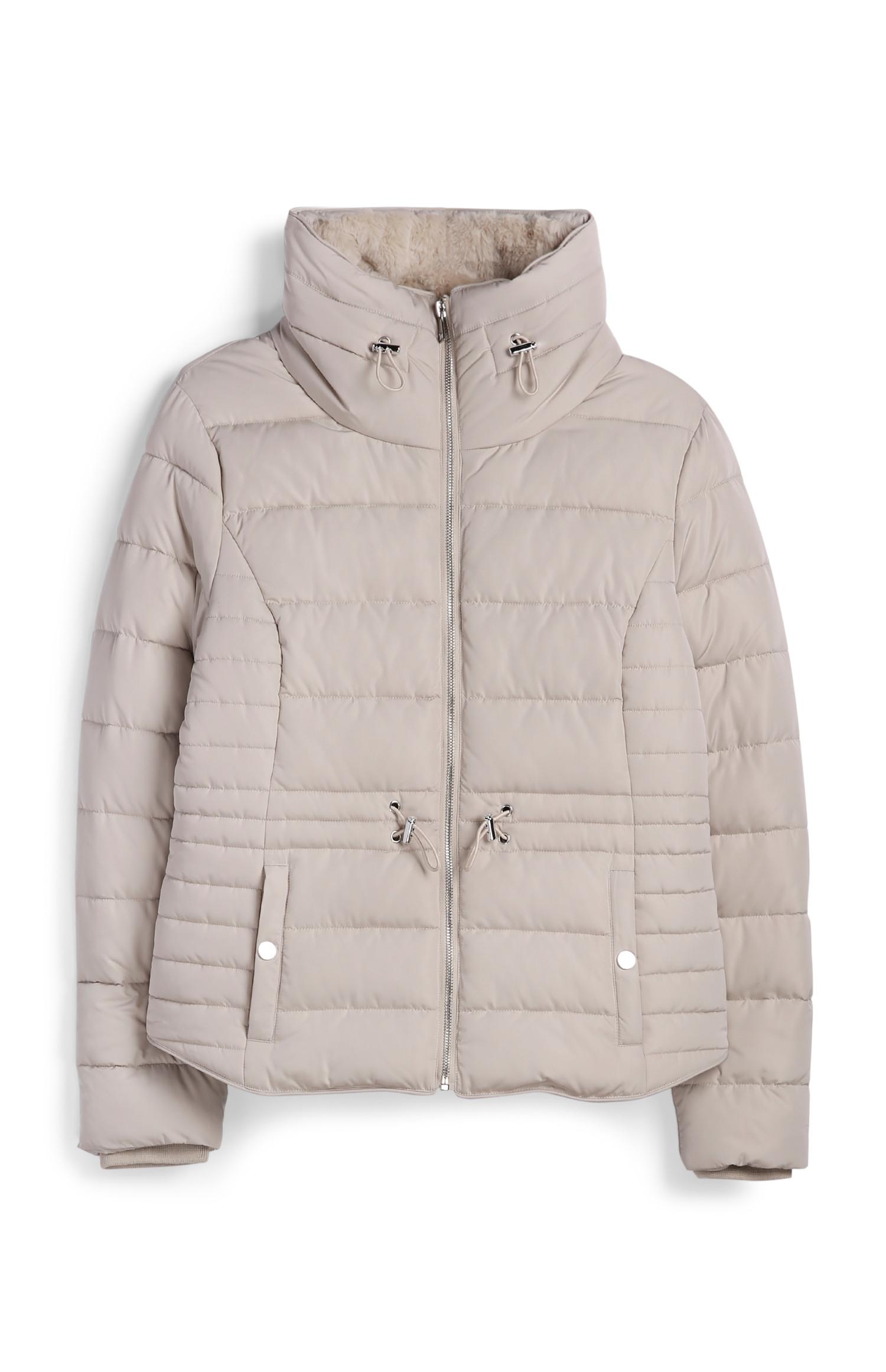 Gevoerde crèmekleurig jas met opstaande kraag