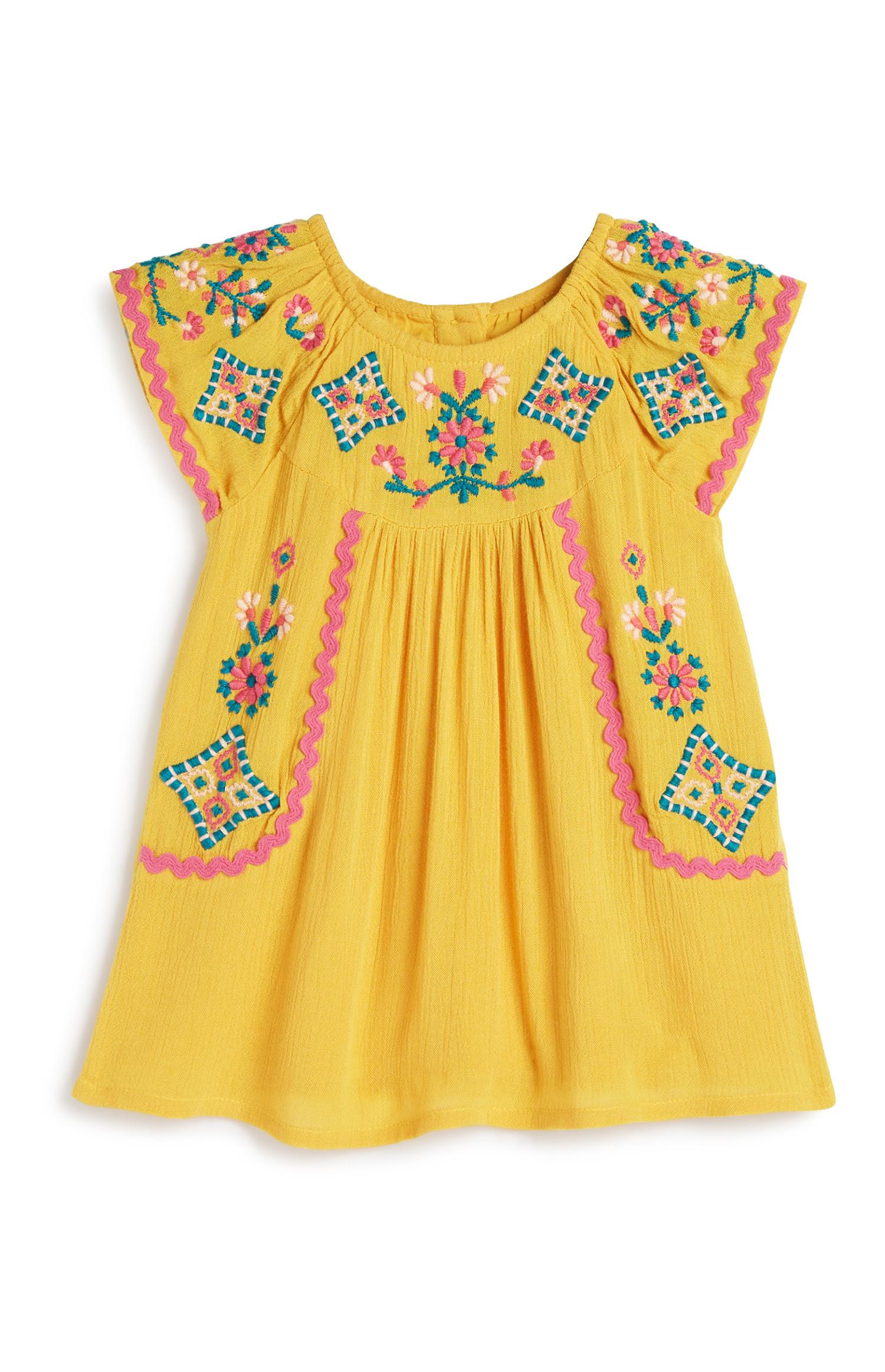 Abito senape a fiori da bimba