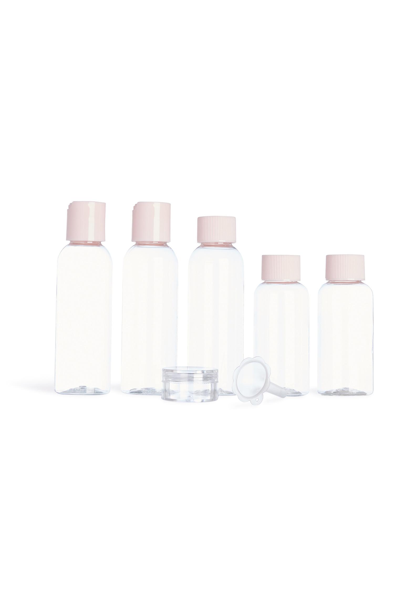 7 flaconi da viaggio