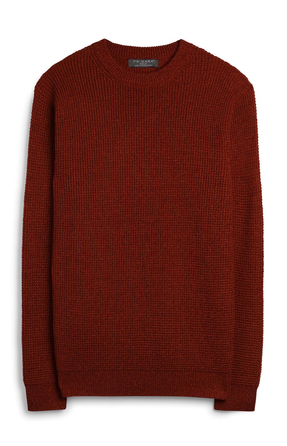 Orangefarbener Strickpullover