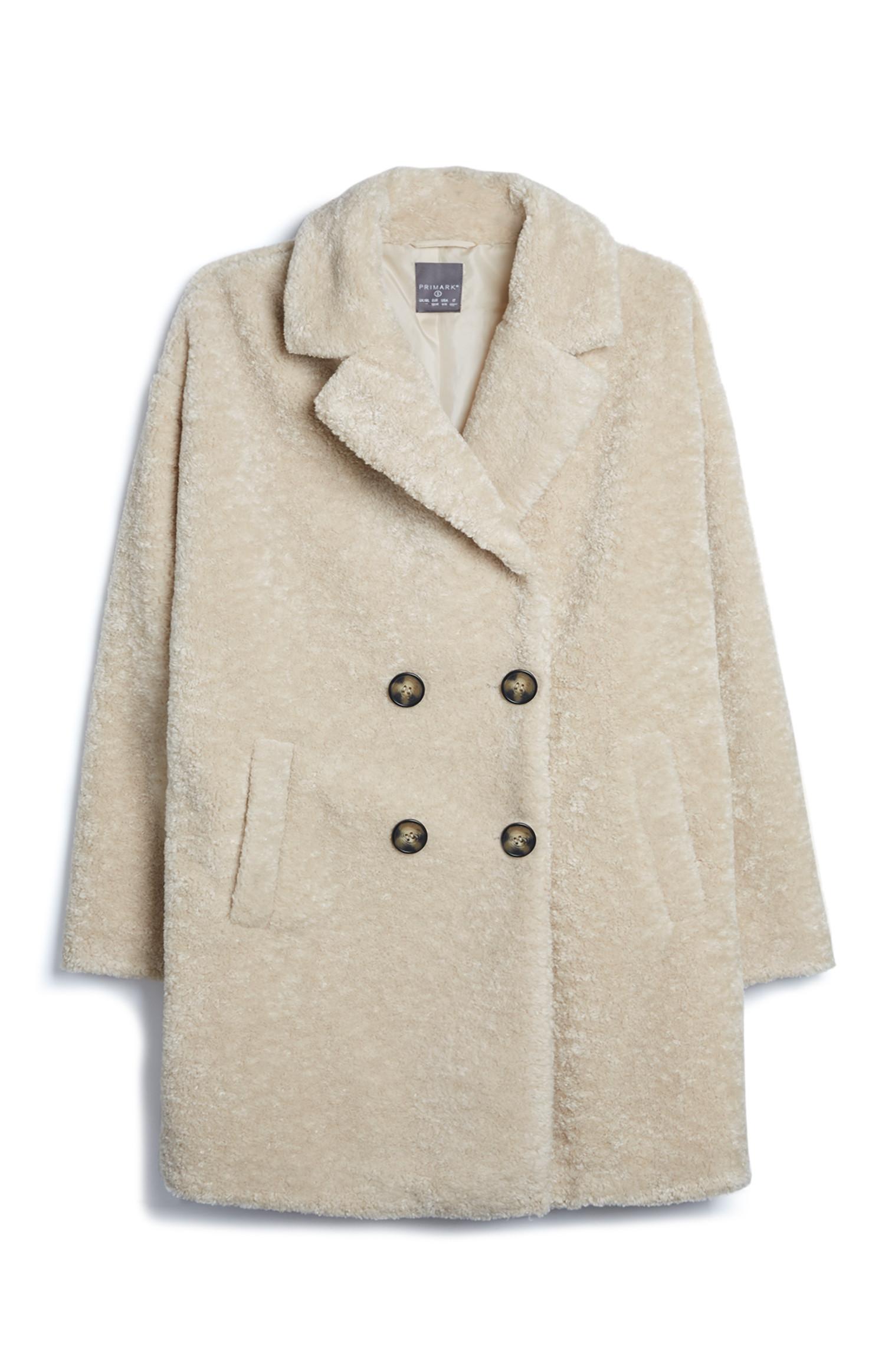 Jas van crèmekleurige teddystof