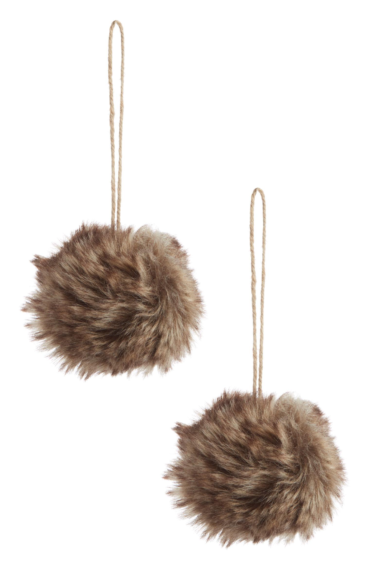 2 palline marroni in pelliccia sintetica