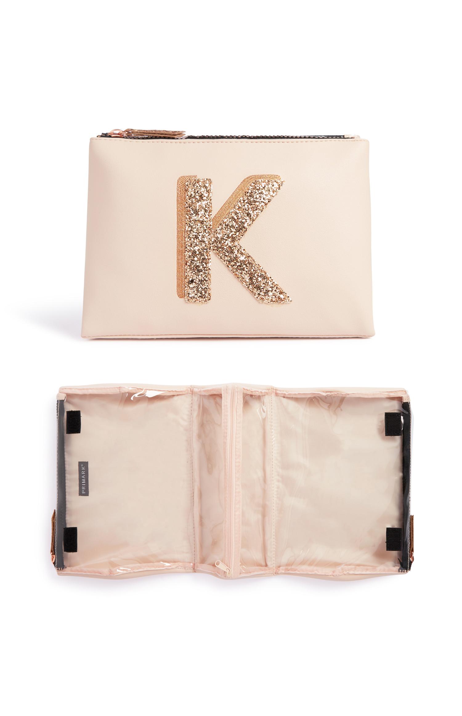 Toilettas met glitterinitiaal