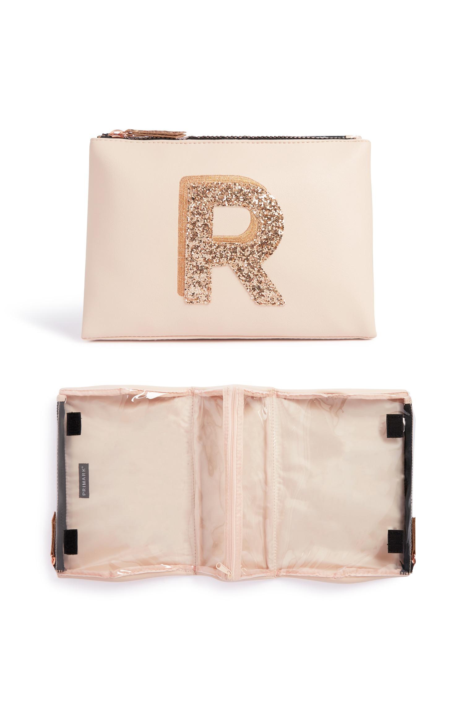 Toilettas met glitterinitiaal