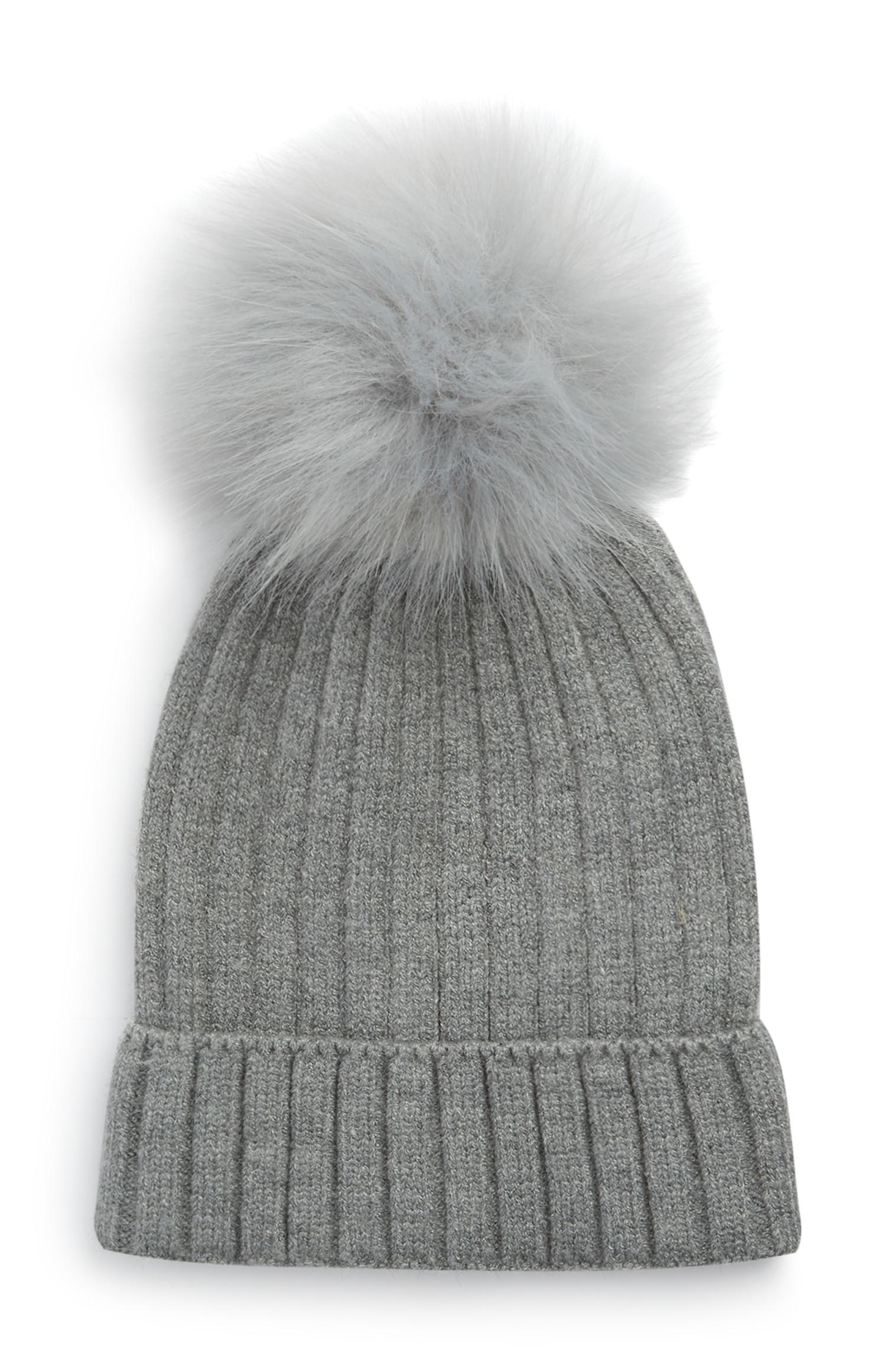 Berretto con pompon in pelliccia sintetica