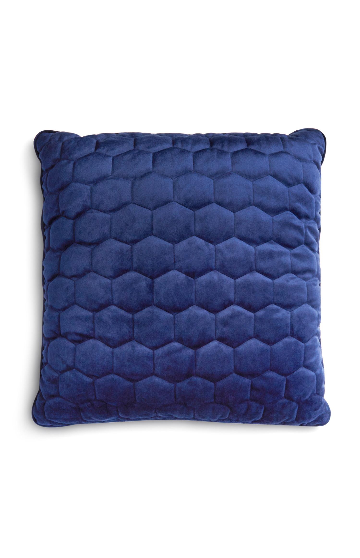 Cuscino blu con stampa a nido d'ape