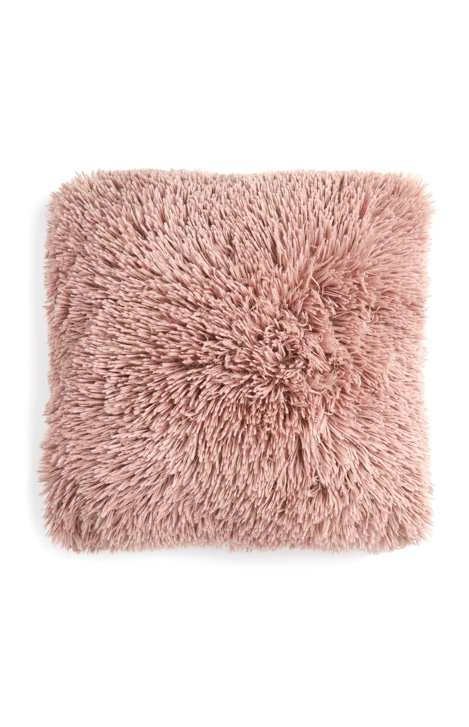 Cuscino rosa in morbido pelo