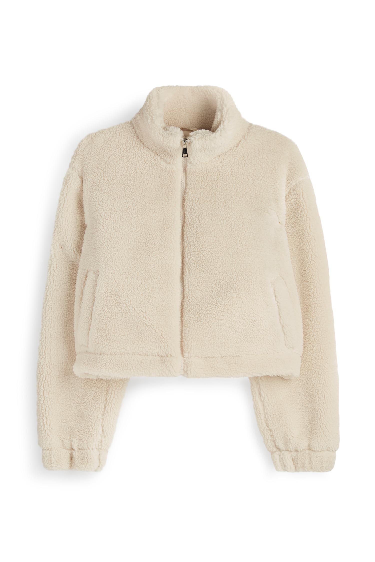 Crèmekleurige korte jas van lammy