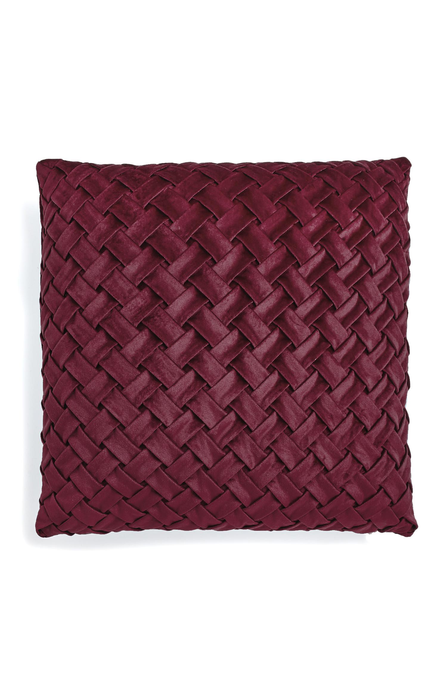 Cuscino bordeaux intrecciato in velluto