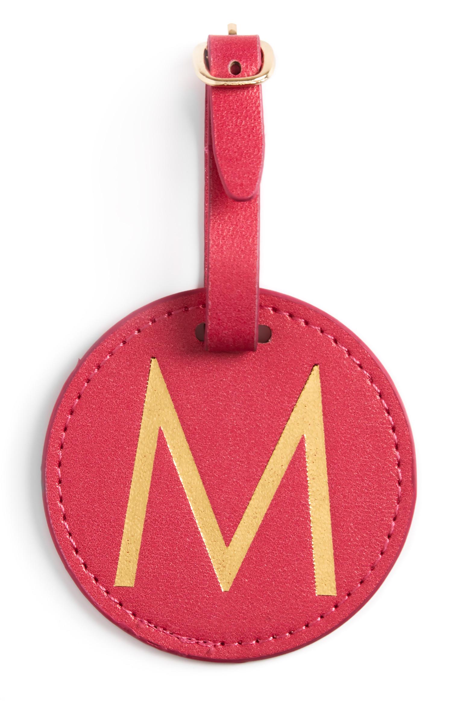 Etichetta bagaglio rossa con iniziale