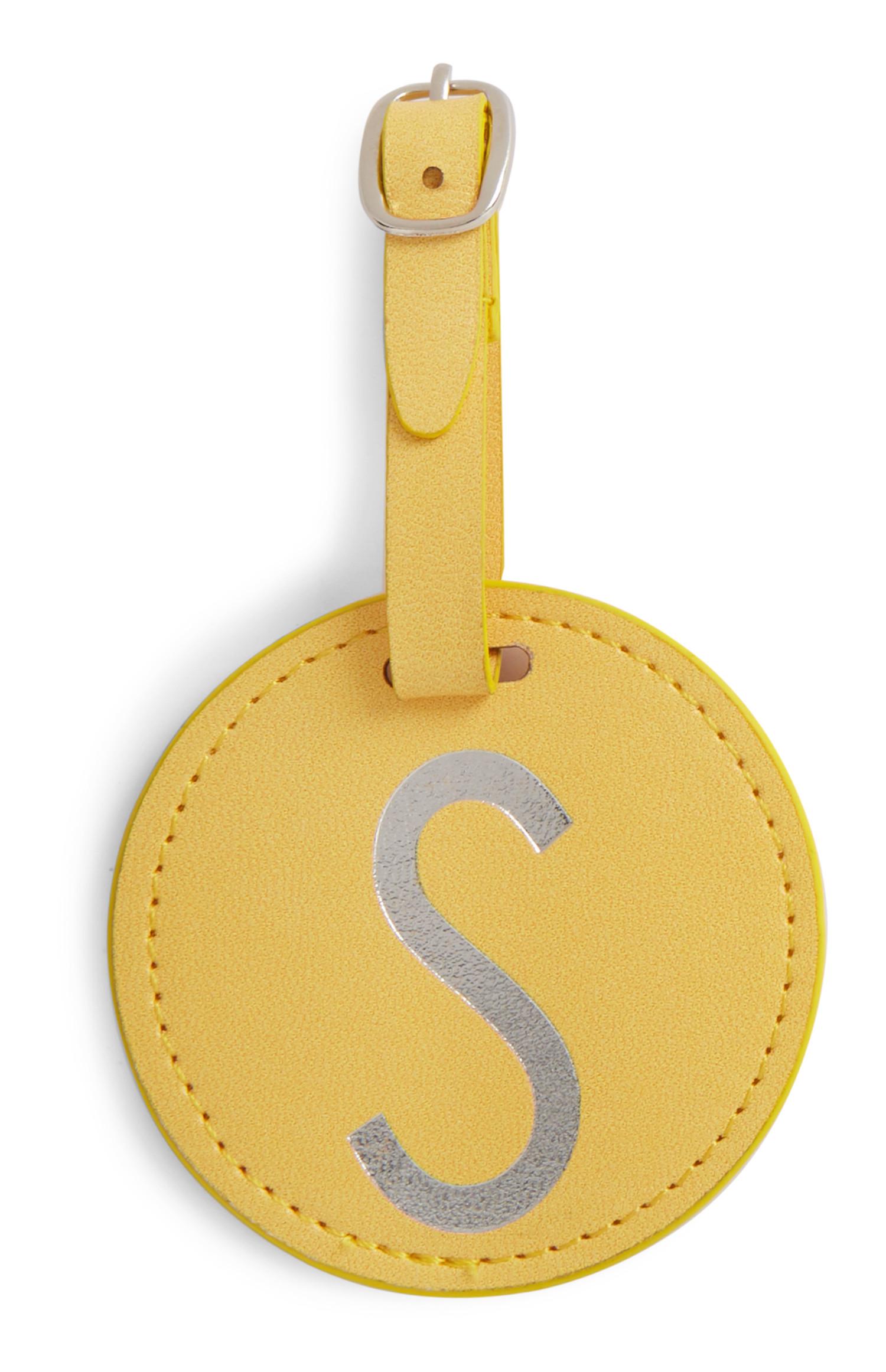 Etichetta bagaglio gialla con iniziale