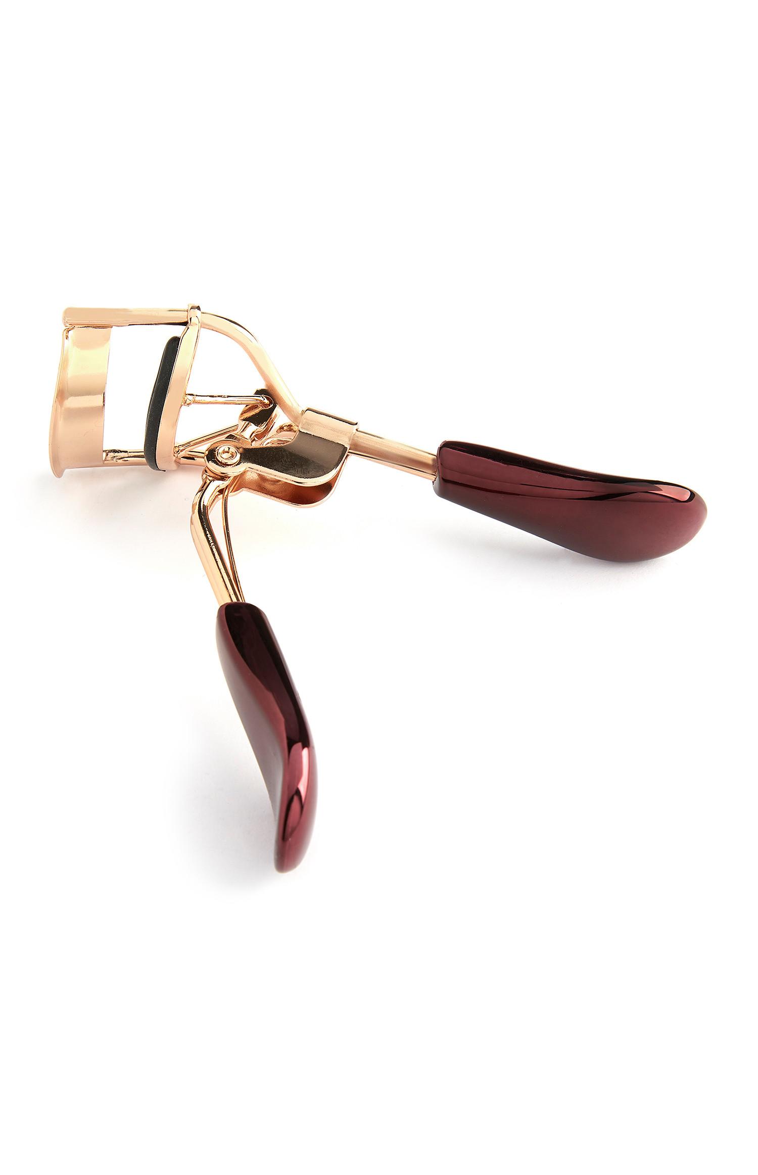 Piegaciglia bordeaux e oro